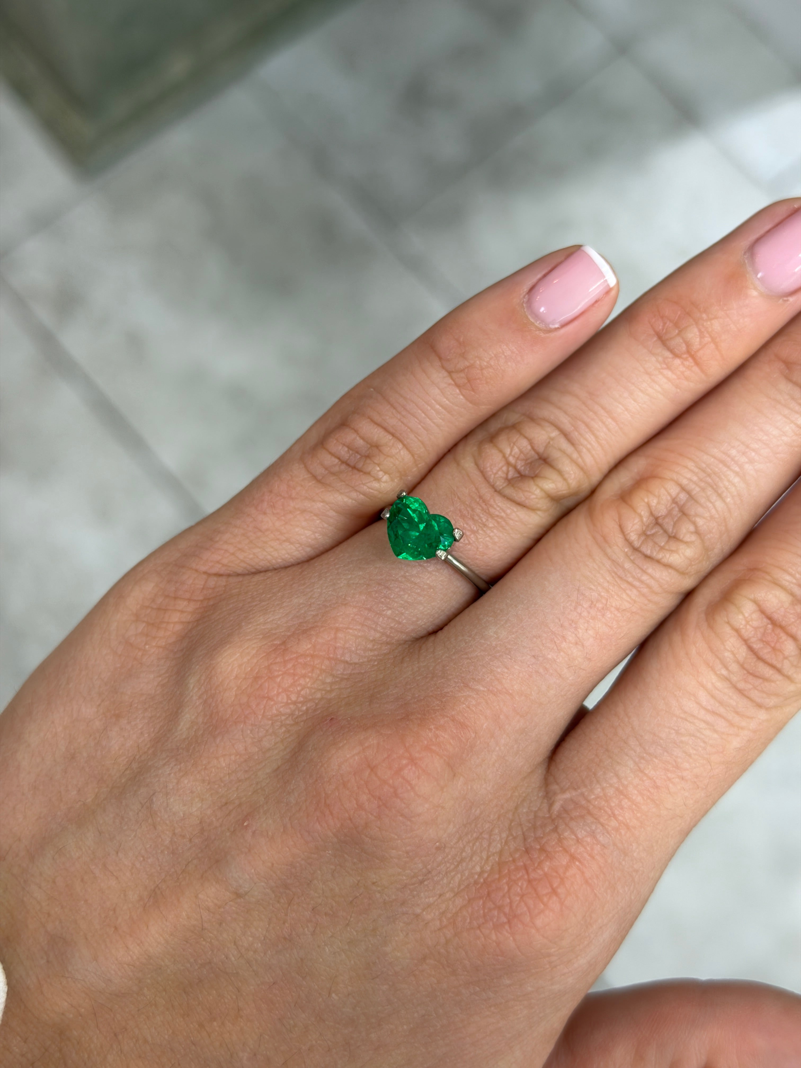 1.94 carat AAA+ vivid intense Muzo green Colombian emerald heart-shaped loose gemstone from JR Colombian Emeralds.