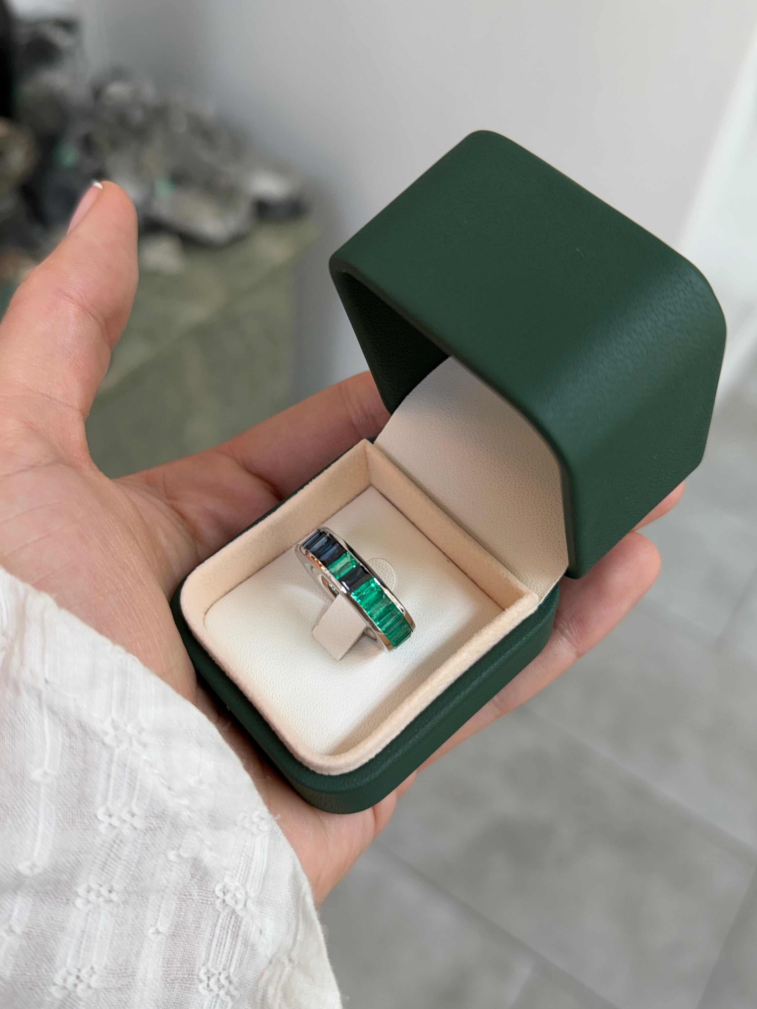 Platinum eternity band with 10.05tcw AAA+ Colombian emerald and blue sapphire baguette stones, size 7 by JR Colombian Emeralds.