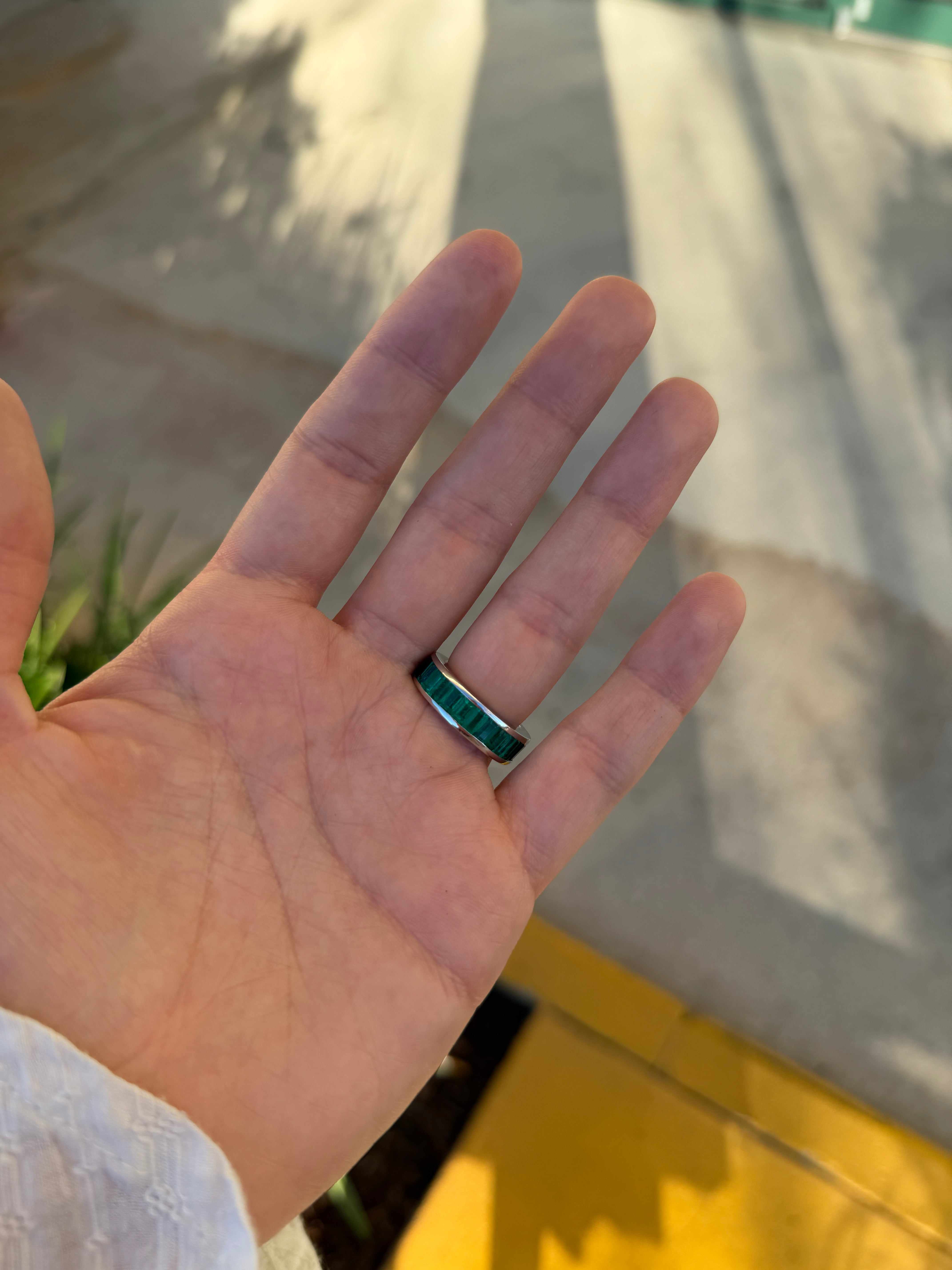Platinum eternity band with 10.05ctw Colombian emerald and blue sapphire baguette gemstones, size 7, by JR Colombian Emeralds.
