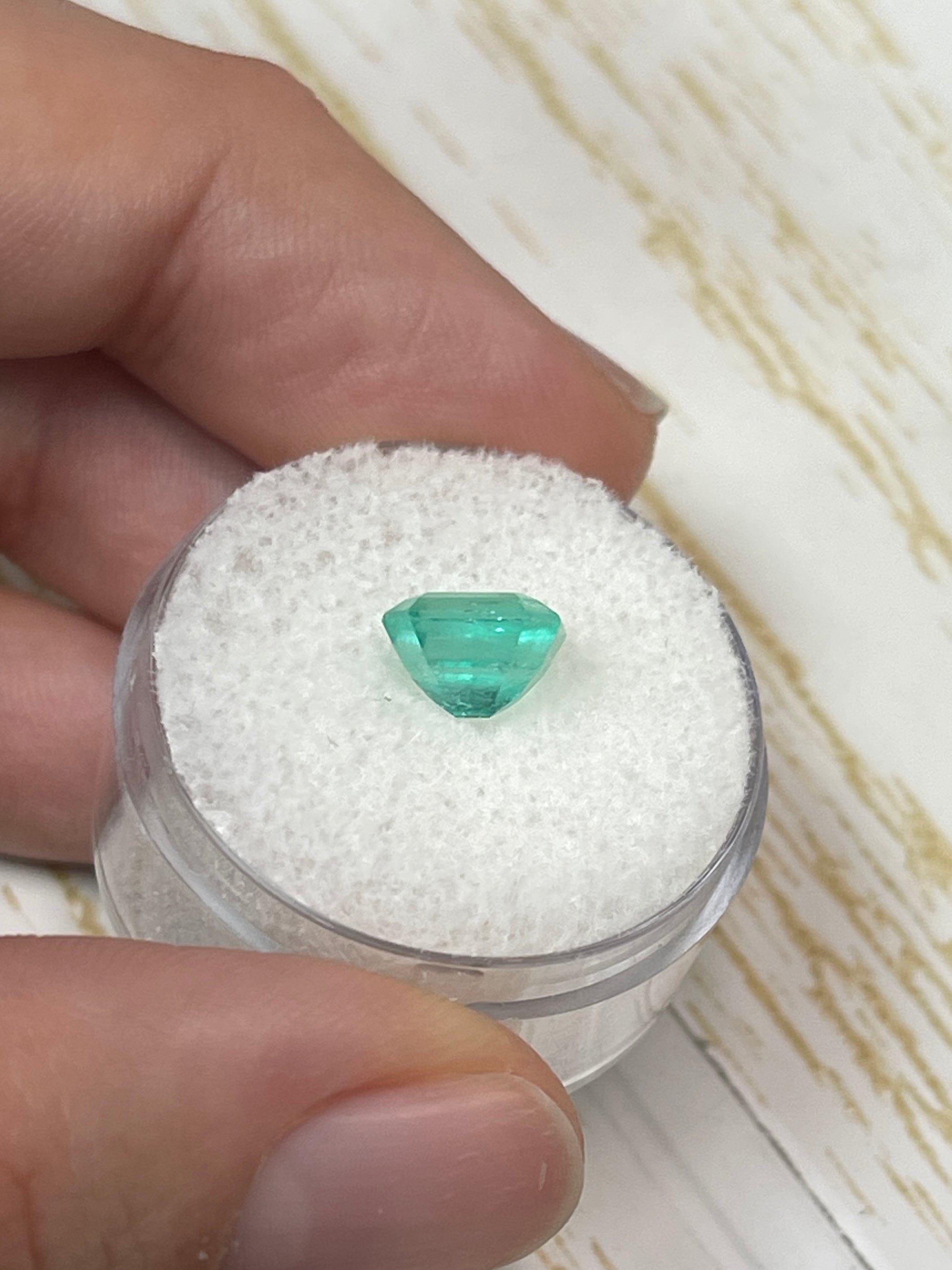 2.03 carat bluish green emerald cut Colombian emerald with eye-clean clarity and natural unset gemstone from JR Colombian Emeralds