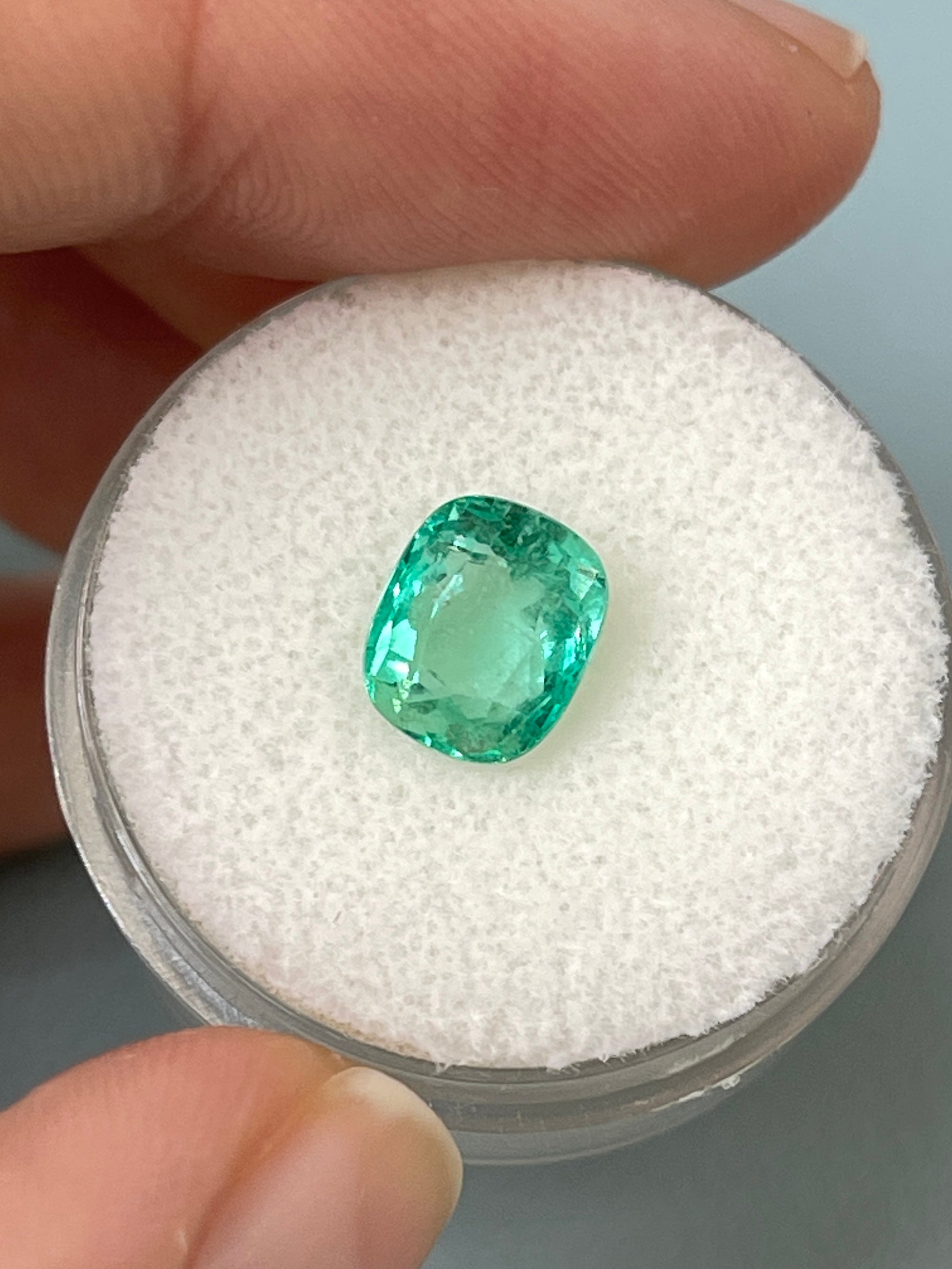 2.06 Carat minty bluish-green Colombian emerald loose cushion cut gemstone from JR Colombian Emeralds.
