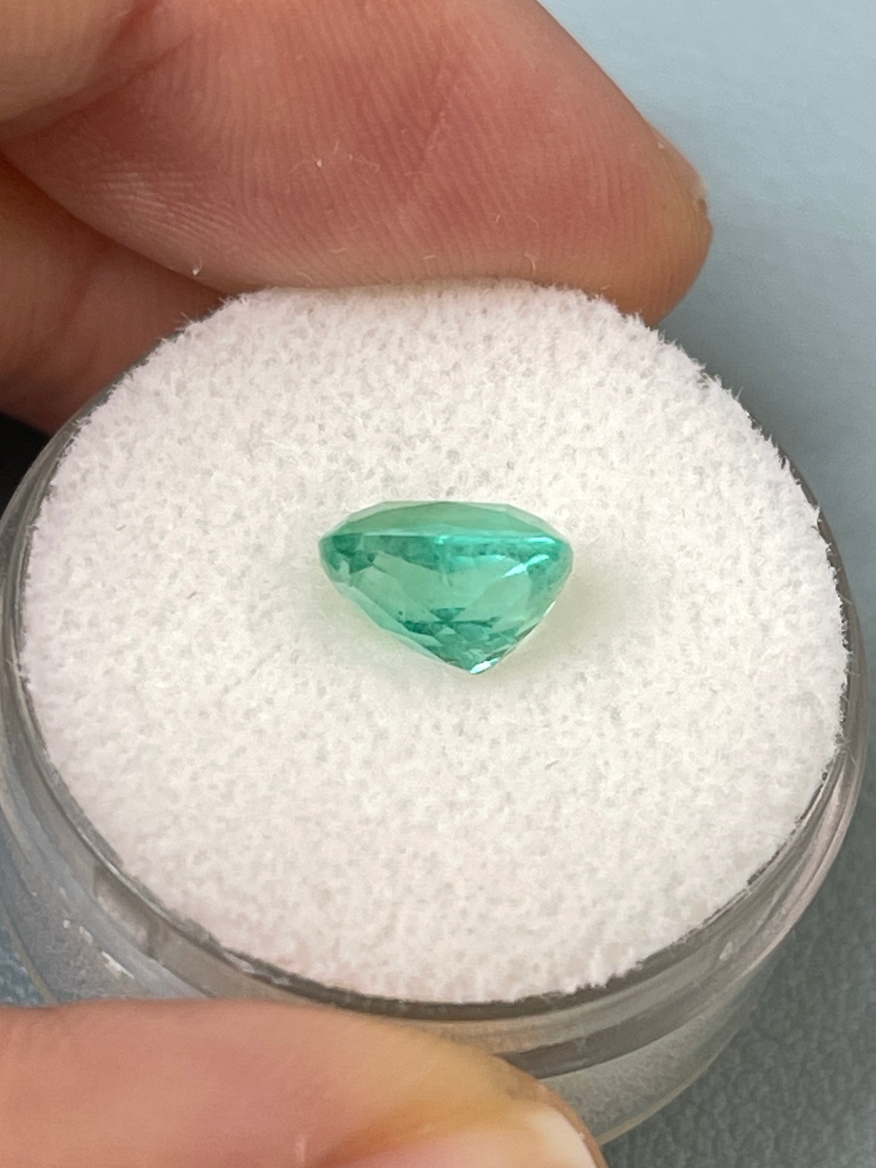 2.06 carat natural Colombian emerald loose cushion cut with minty bluish-green color, from JR Colombian Emeralds.