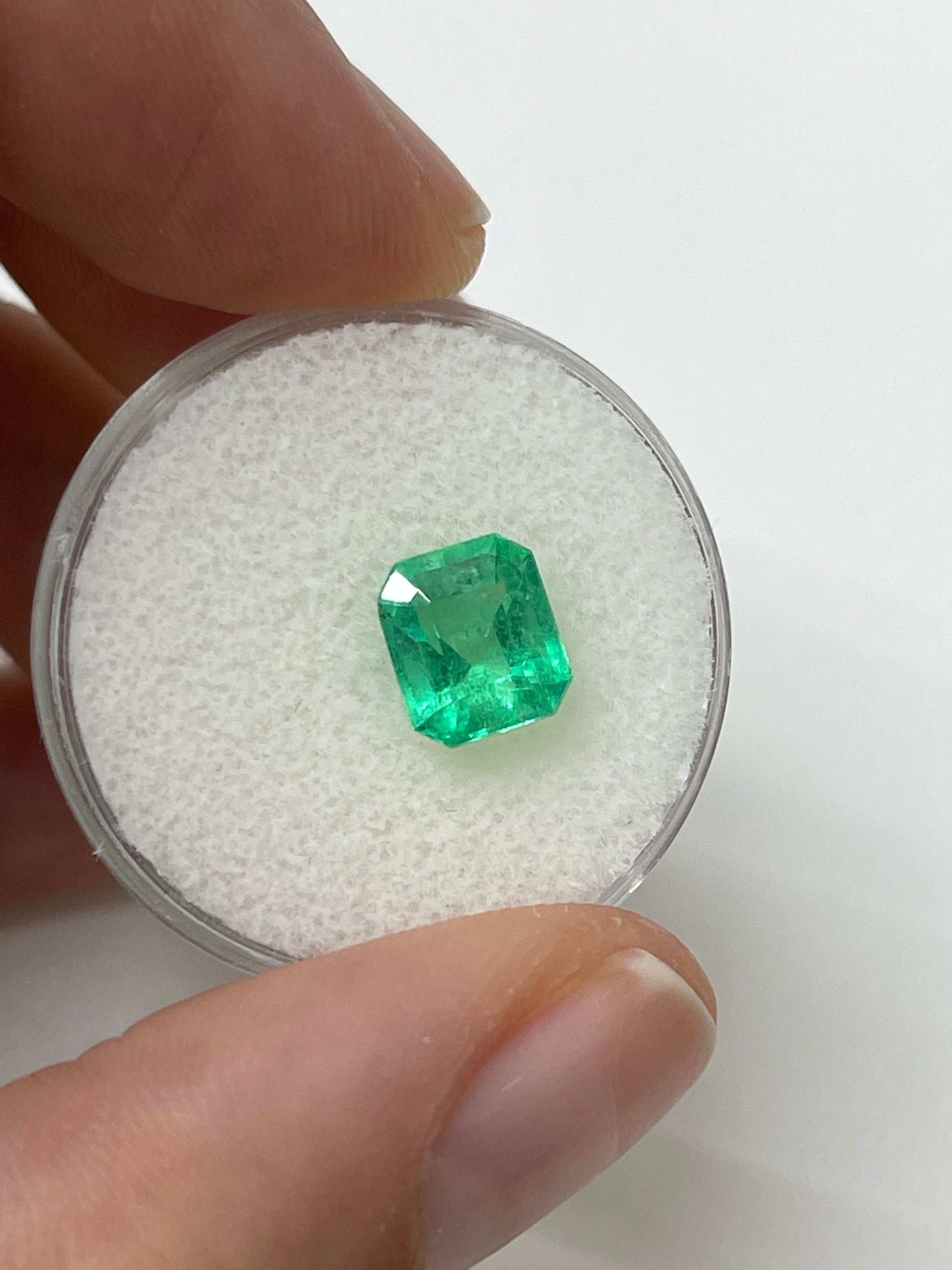 2.08 Carat lime yellowish emerald cut natural Colombian emerald unset, from JR Colombian Emeralds.