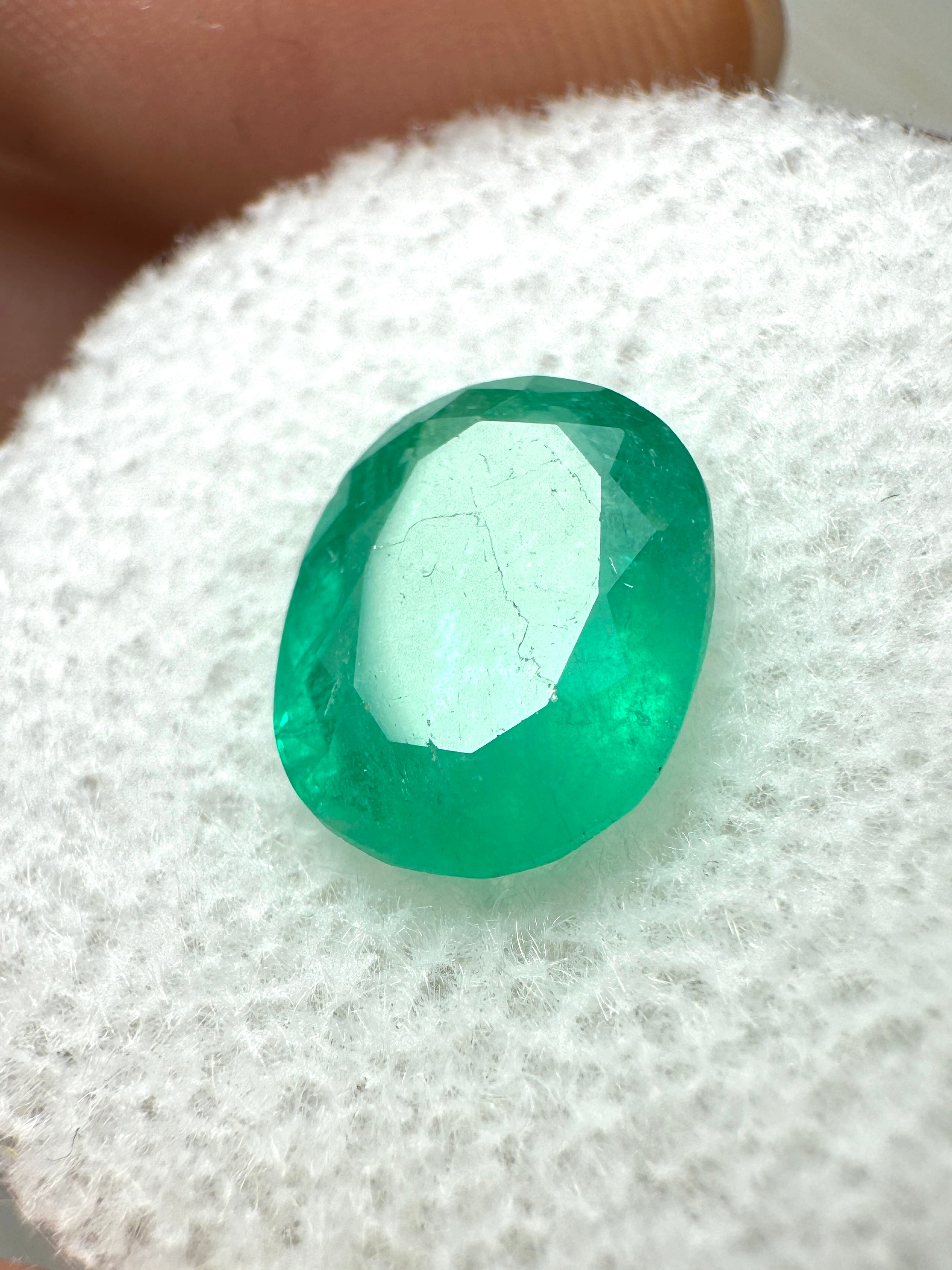 Medium bluish-green 2.11 carat oval cut Colombian emerald gemstone, natural loose stone from JR Colombian Emeralds.