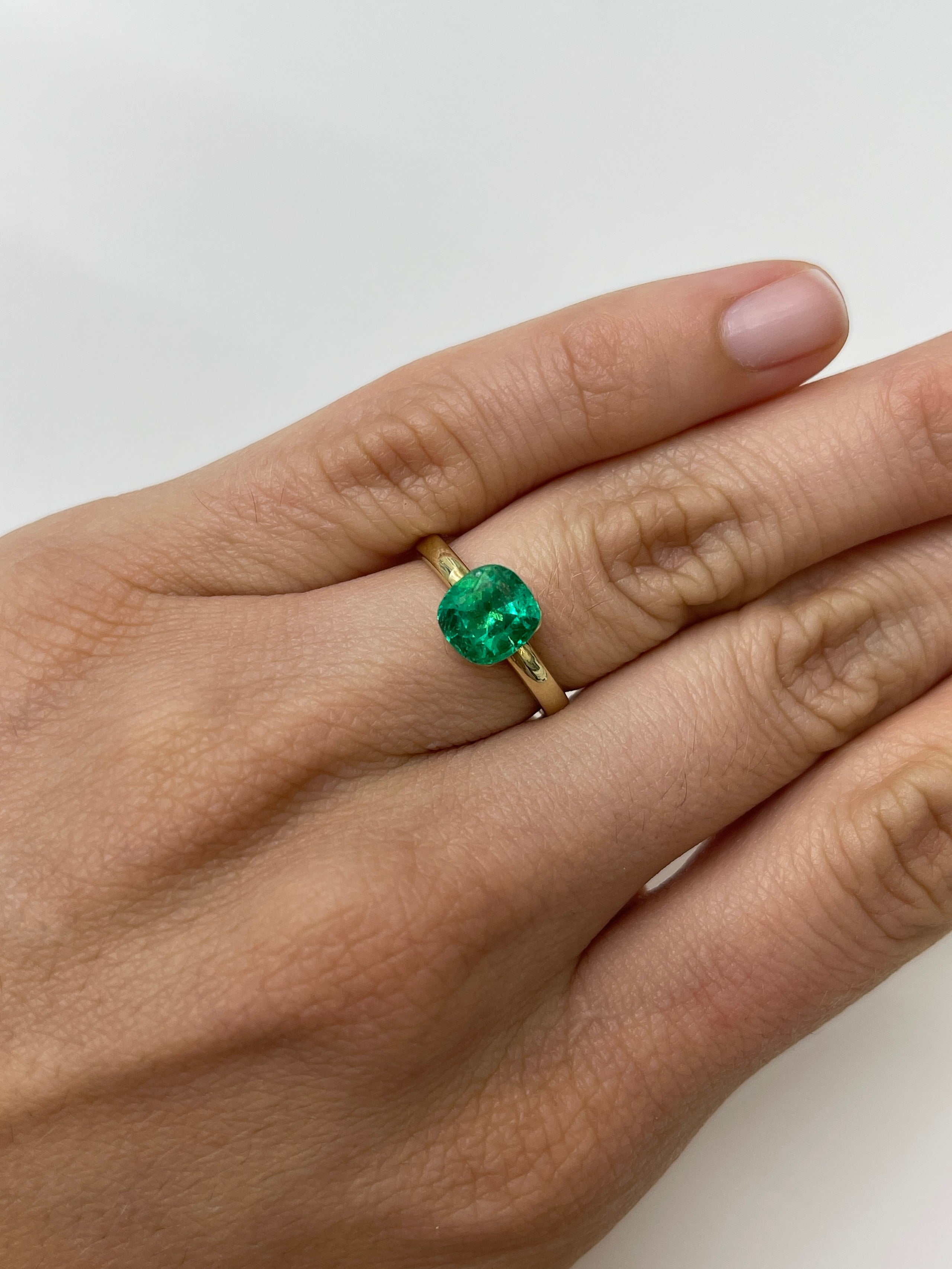 2.13 carat electric Muzo green Colombian emerald, cushion cut, natural loose gemstone from JR Colombian Emeralds.
