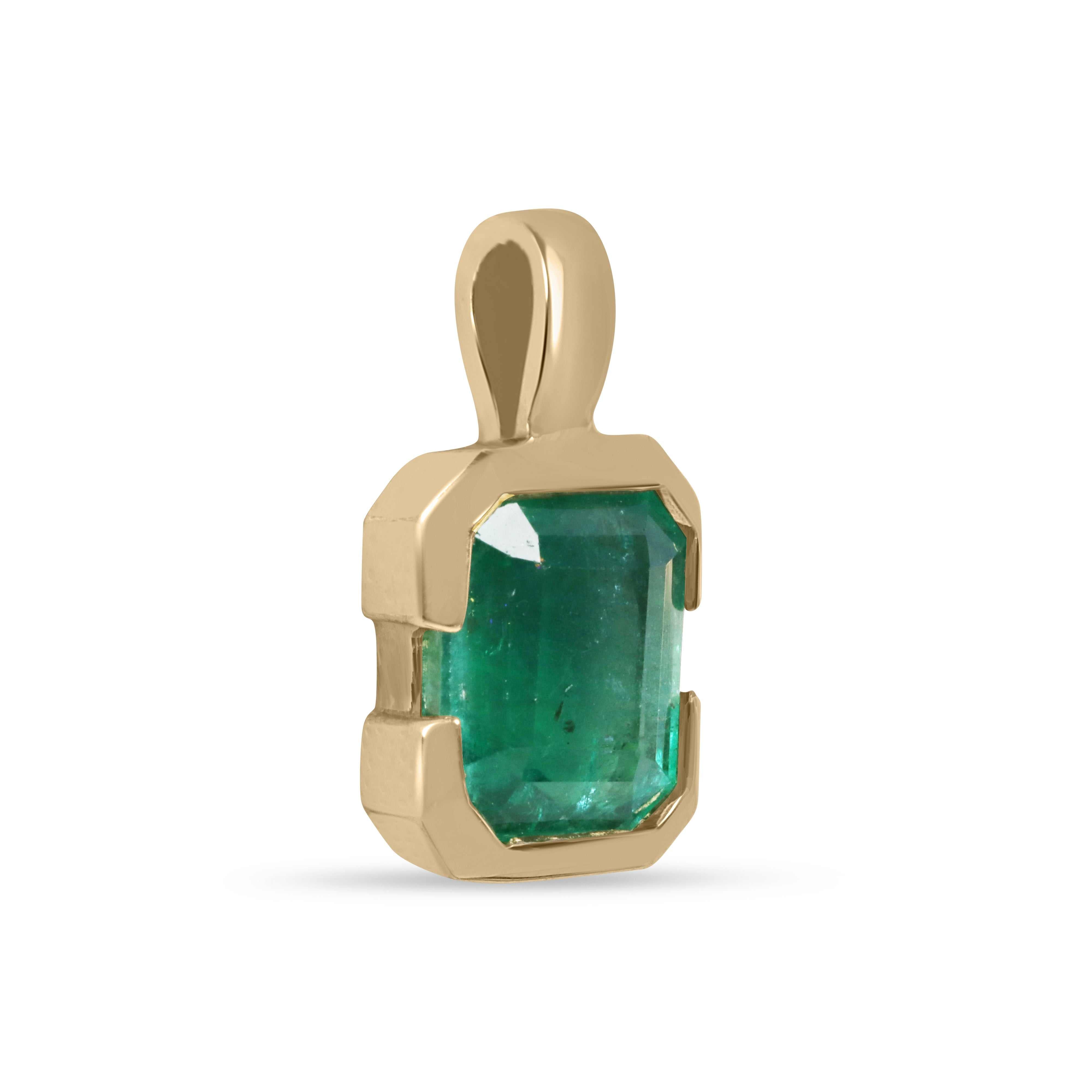 14K gold emerald solitaire necklace featuring a 2.28 carat semi-bezel emerald pendant on a delicate chain, touches the skin.