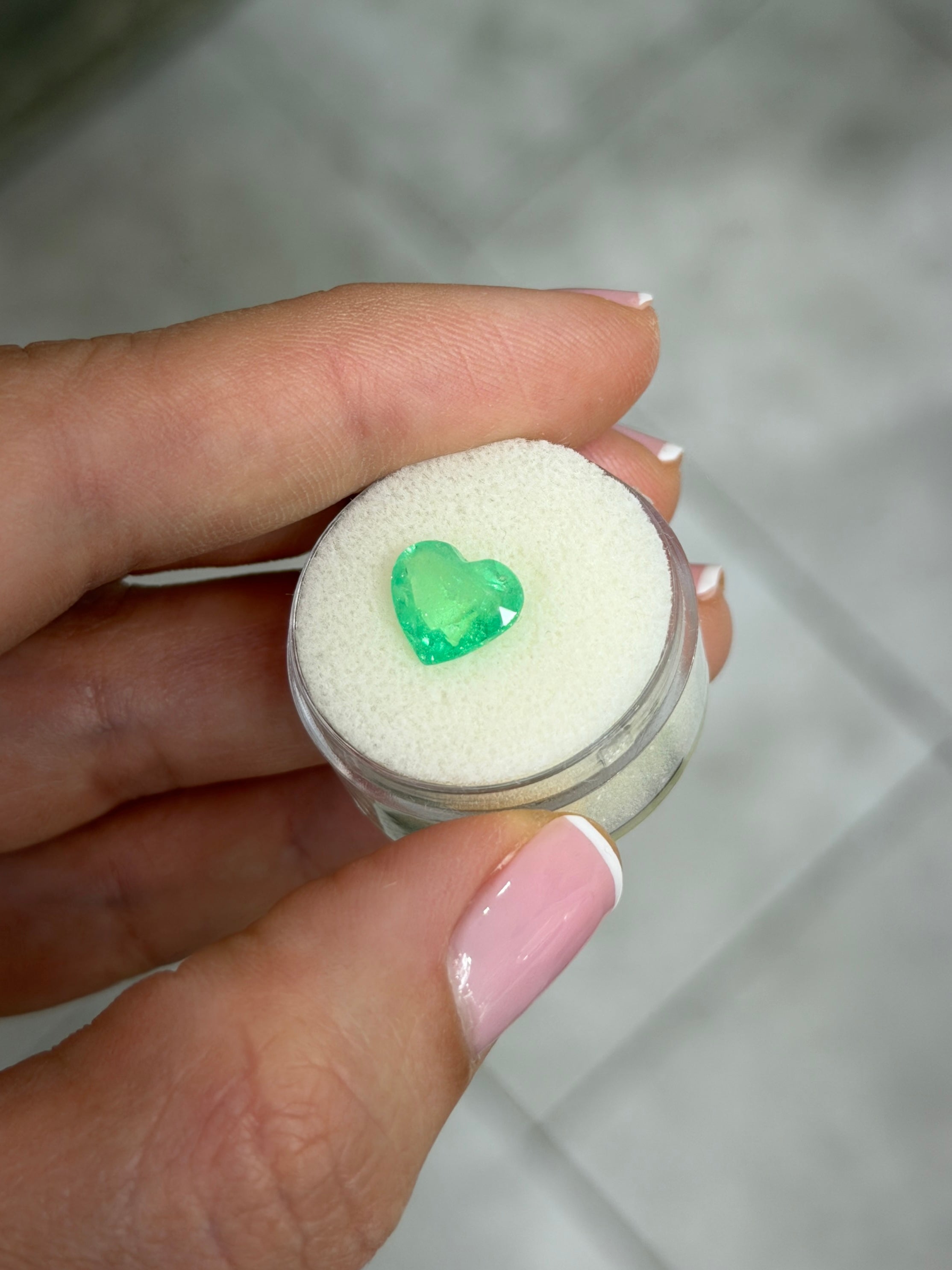 2.30 carat spring yellowish green Colombian emerald loose heart cut gemstone by JR Colombian Emeralds.