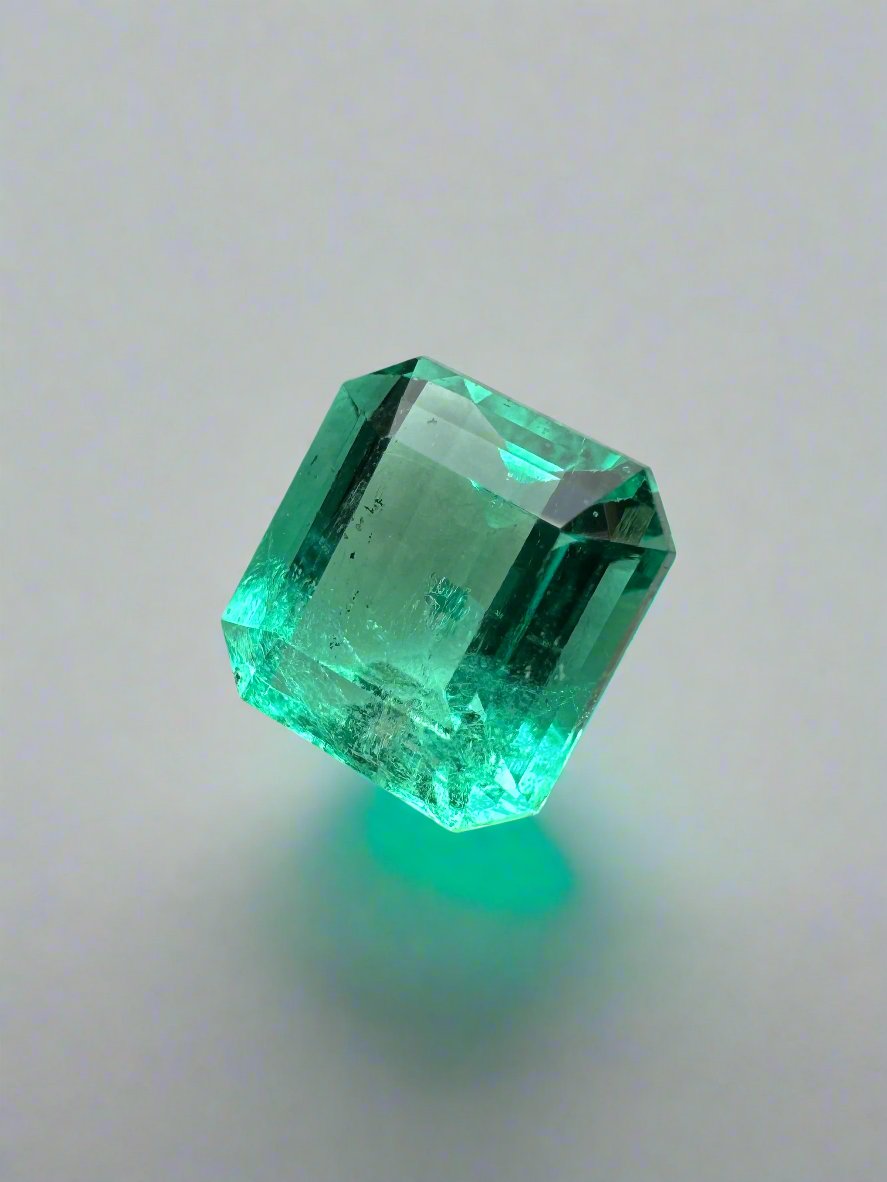 2.36 Carat Gemmy Natural Colombian Emerald in Asscher cut, loose gemstone from JR Colombian Emeralds, showcasing vibrant green color.