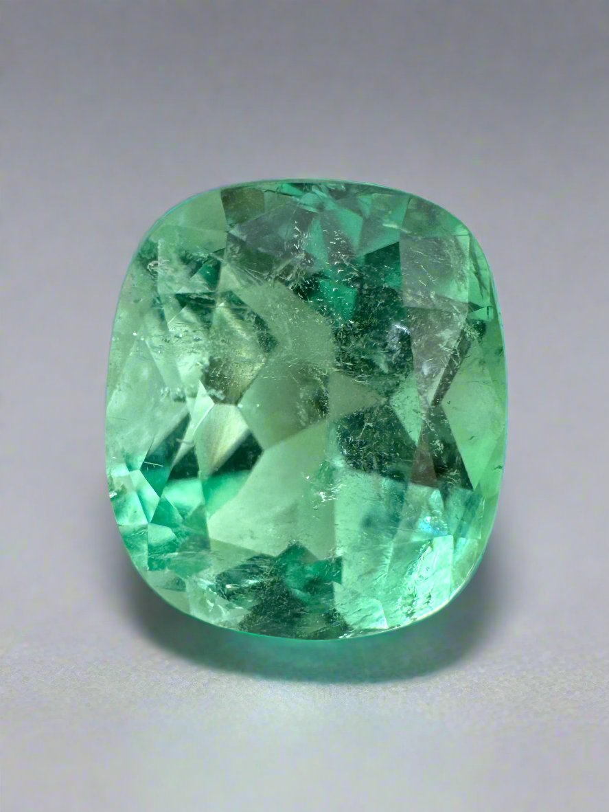 Loose 2.41 carat green Colombian emerald in cushion cut, eye-clean, natural gemstone from JR Colombian Emeralds.