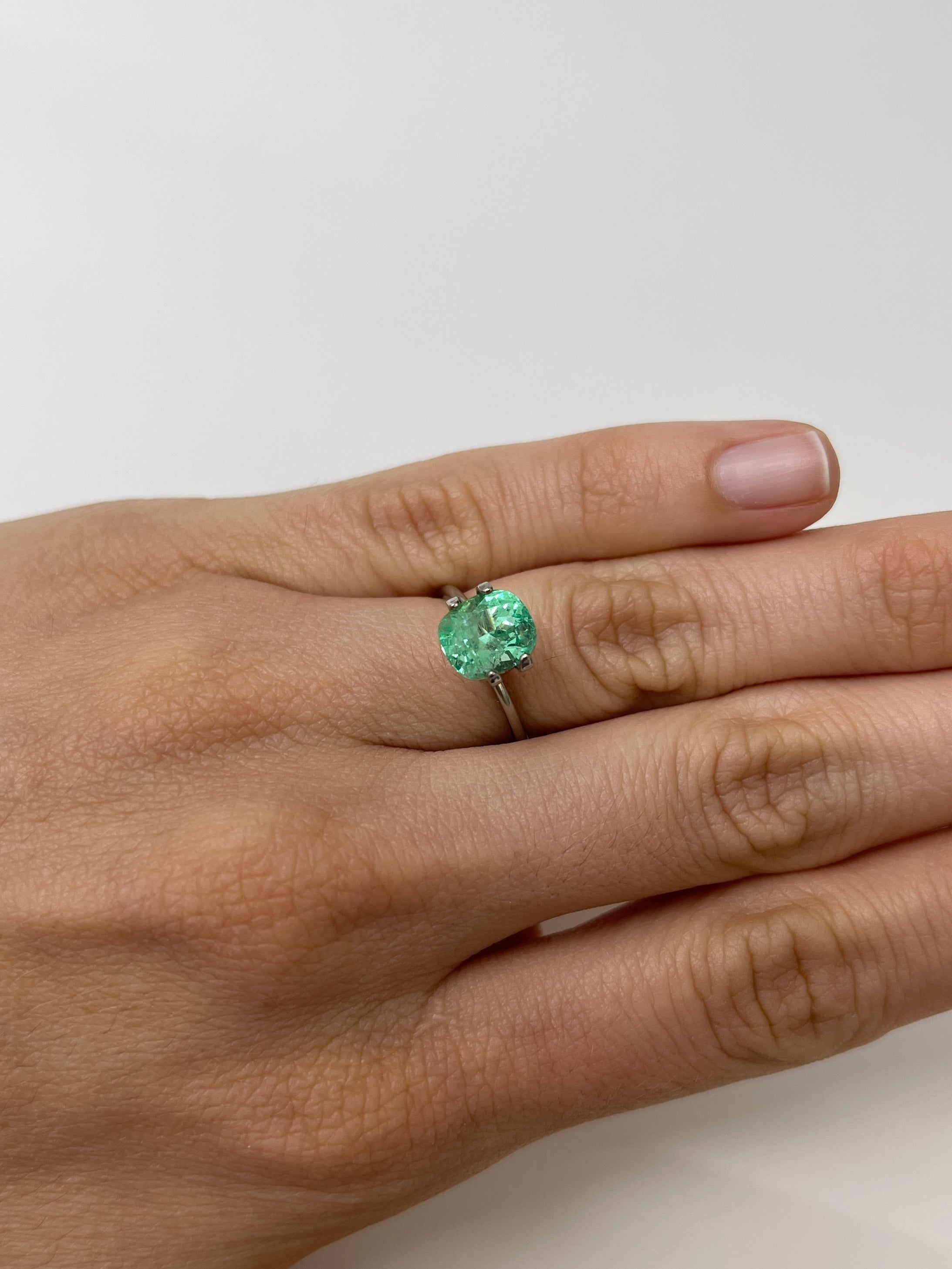 Loose 2.41 carat eye-clean green Colombian emerald in cushion cut, natural and vibrant, from JR Colombian Emeralds.