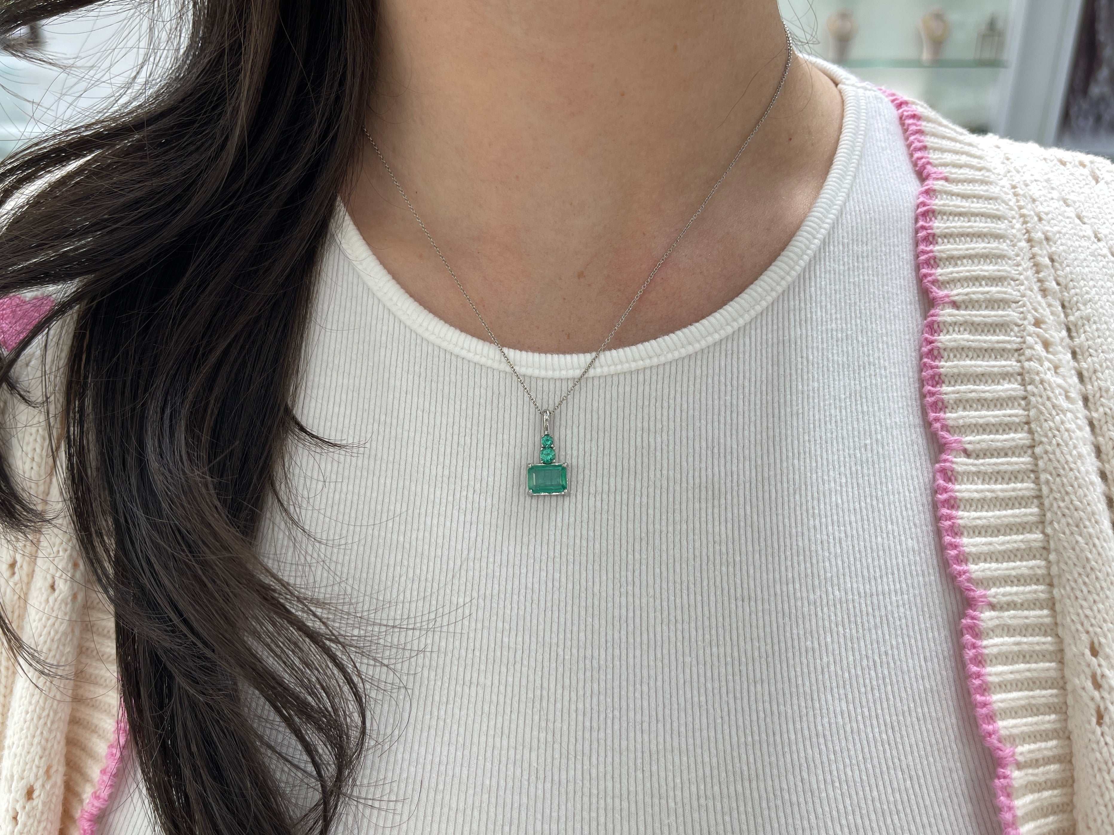 Elegant necklace featuring 2.43tcw clear emerald and round emerald accents in 14K white gold, designed by JR Colombian Emeralds.