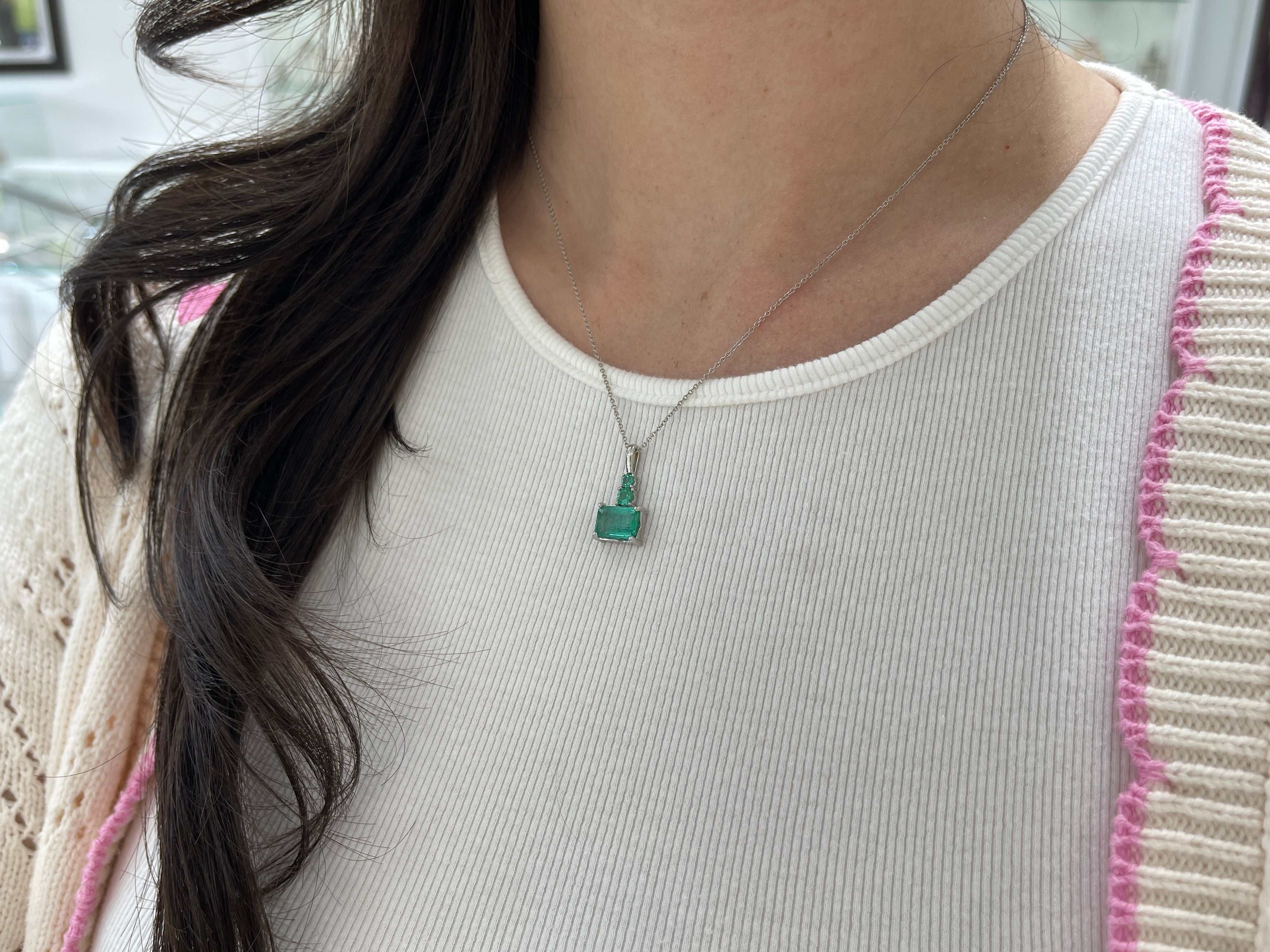 JR Colombian Emeralds 14K white gold necklace with 2.43 carat clear East-to-West emerald and round emerald accents.