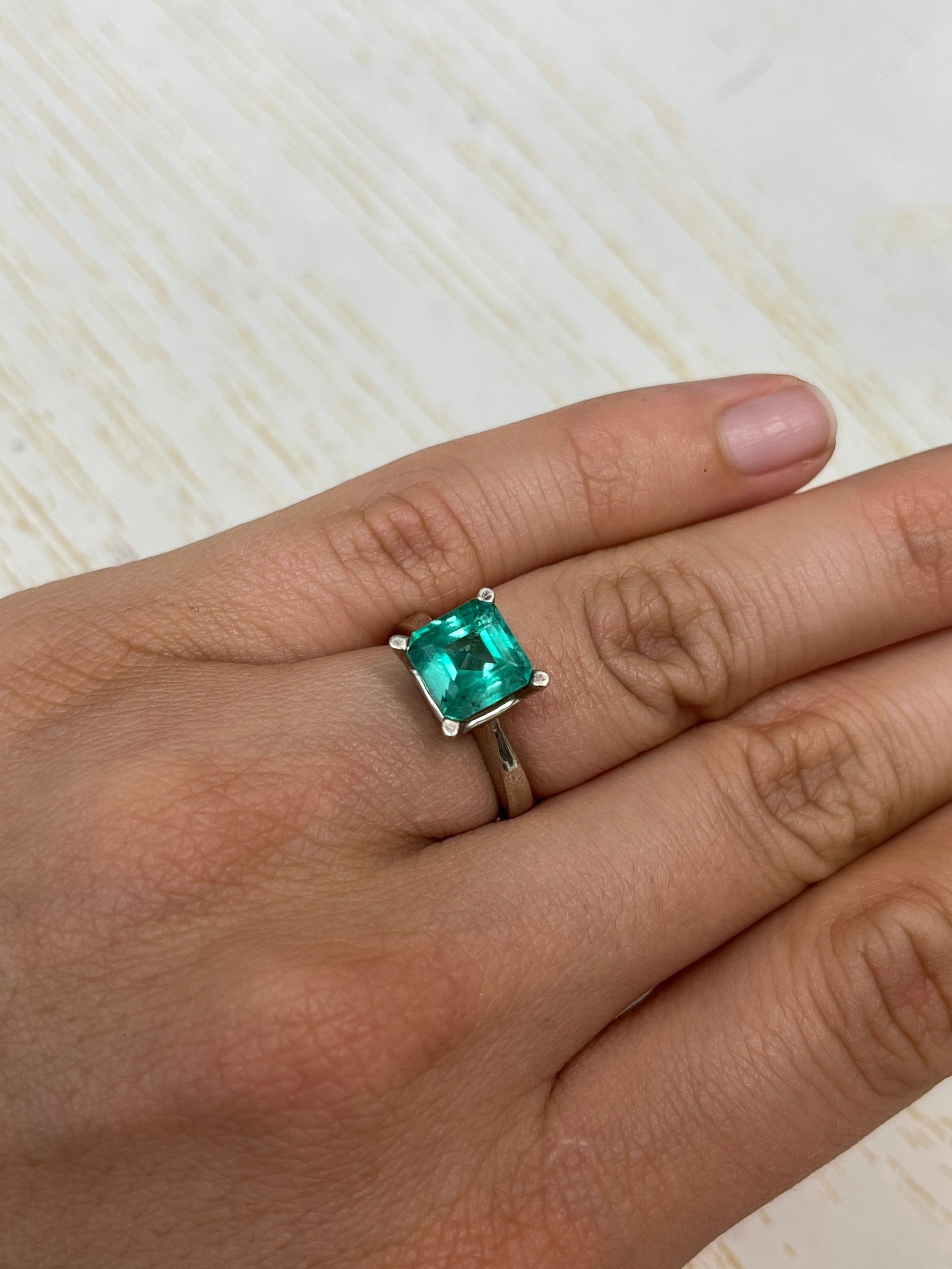 2.44 Carat bluish green Colombian emerald loose gemstone with natural freckles, Asscher cut, from JR Colombian Emeralds.
