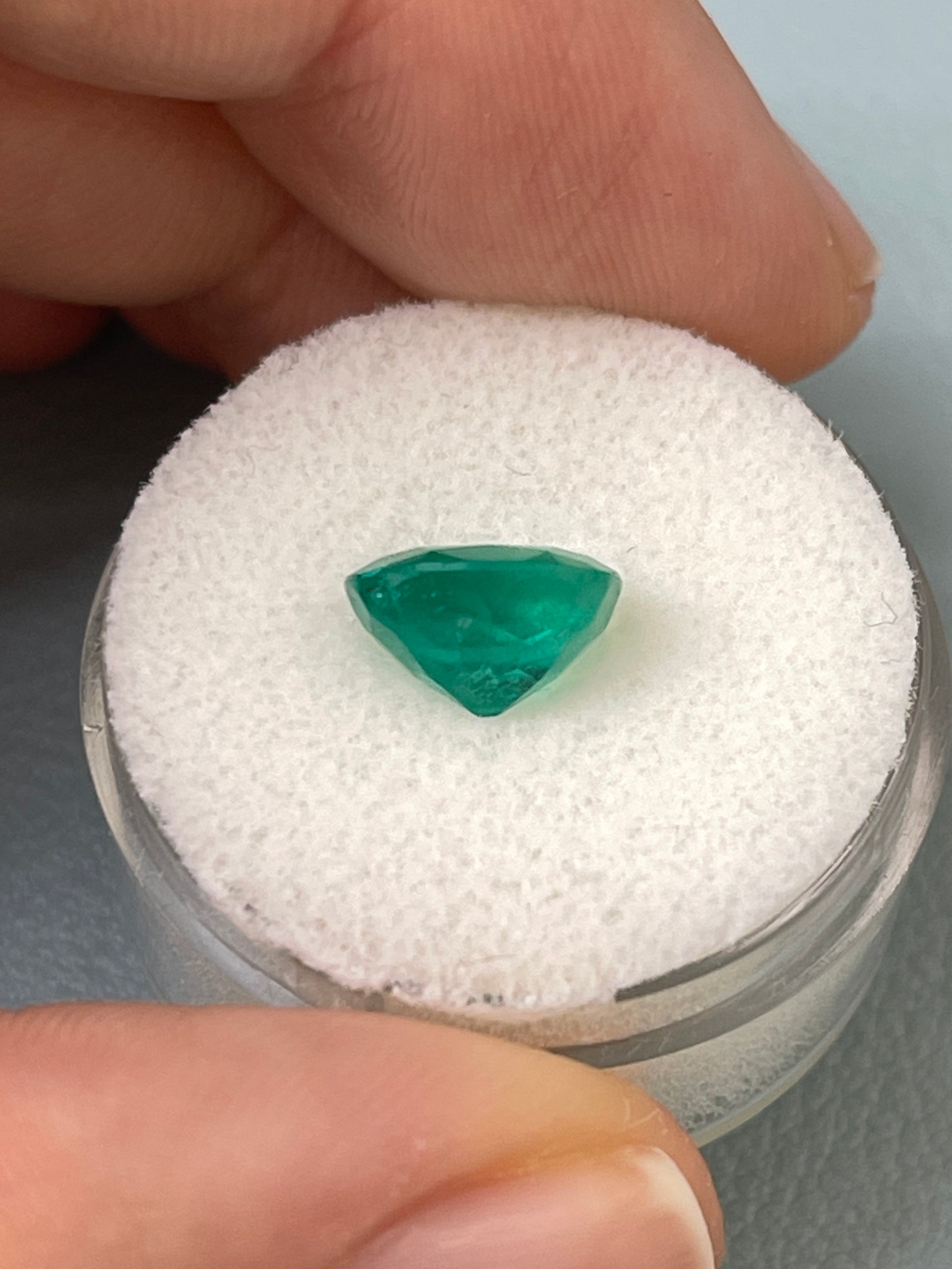 Deep green 2.55 carat Colombian emerald loose cushion cut gemstone from JR Colombian Emeralds, natural and vibrant in appearance.