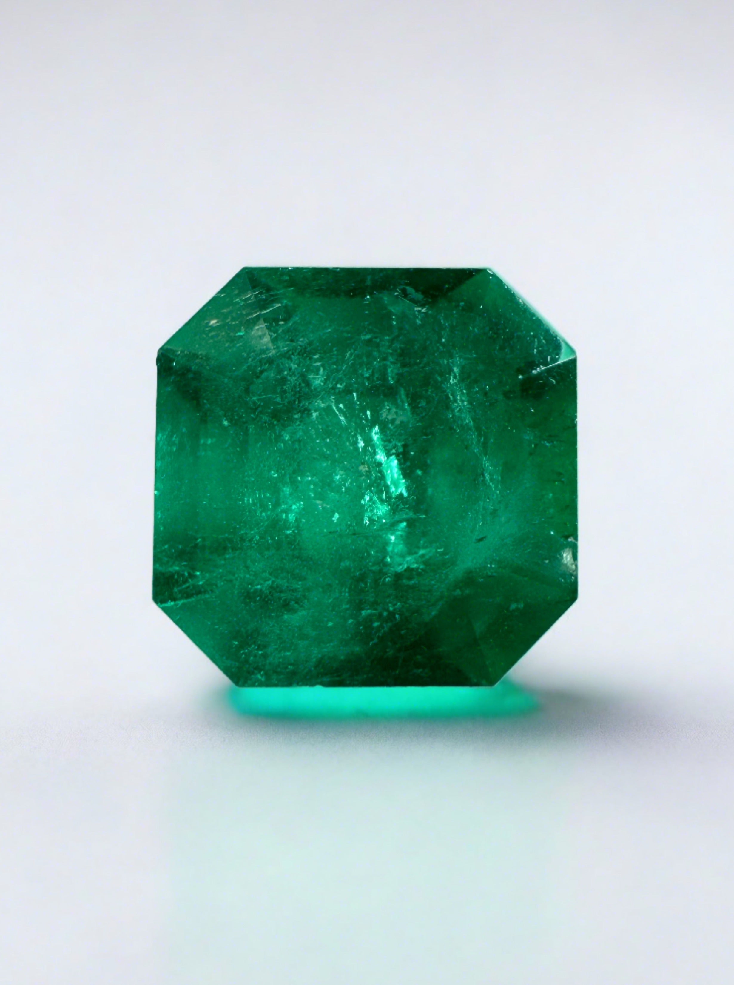 2.55 carat forest Muzo green Colombian emerald loose gemstone in an Asscher cut, from JR Colombian Emeralds.