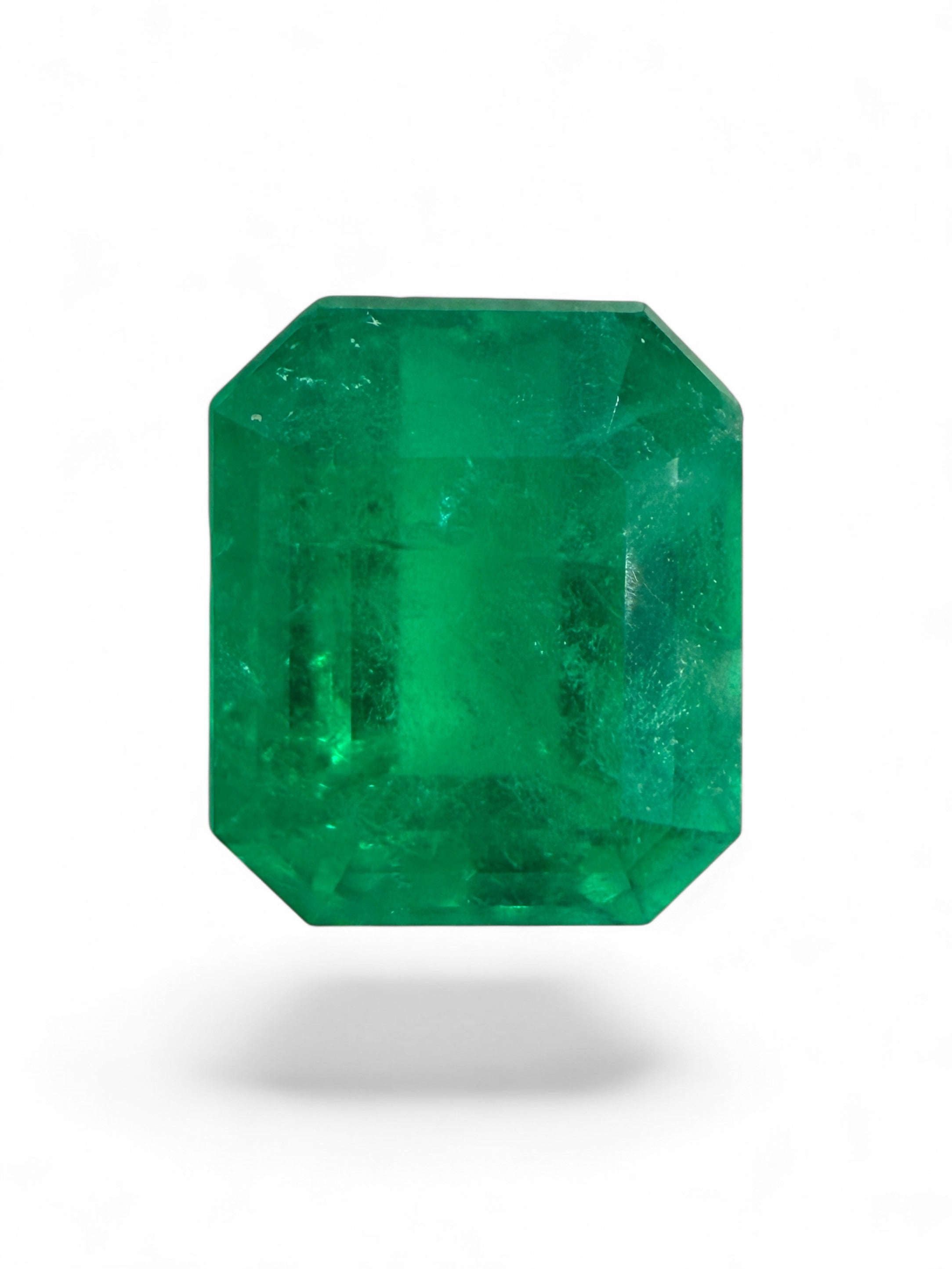 Natural 2.57 Carat Colombian Emerald gemstone in 9x7 emerald cut with vivid yellowish green color, from JR Colombian Emeralds.