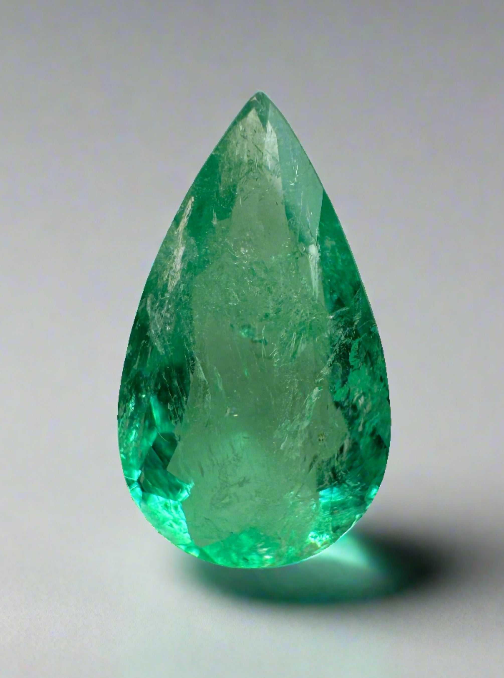 Natural 2.61 carat Colombian emerald loose gemstone with pear cut and green color, from JR Colombian Emeralds.