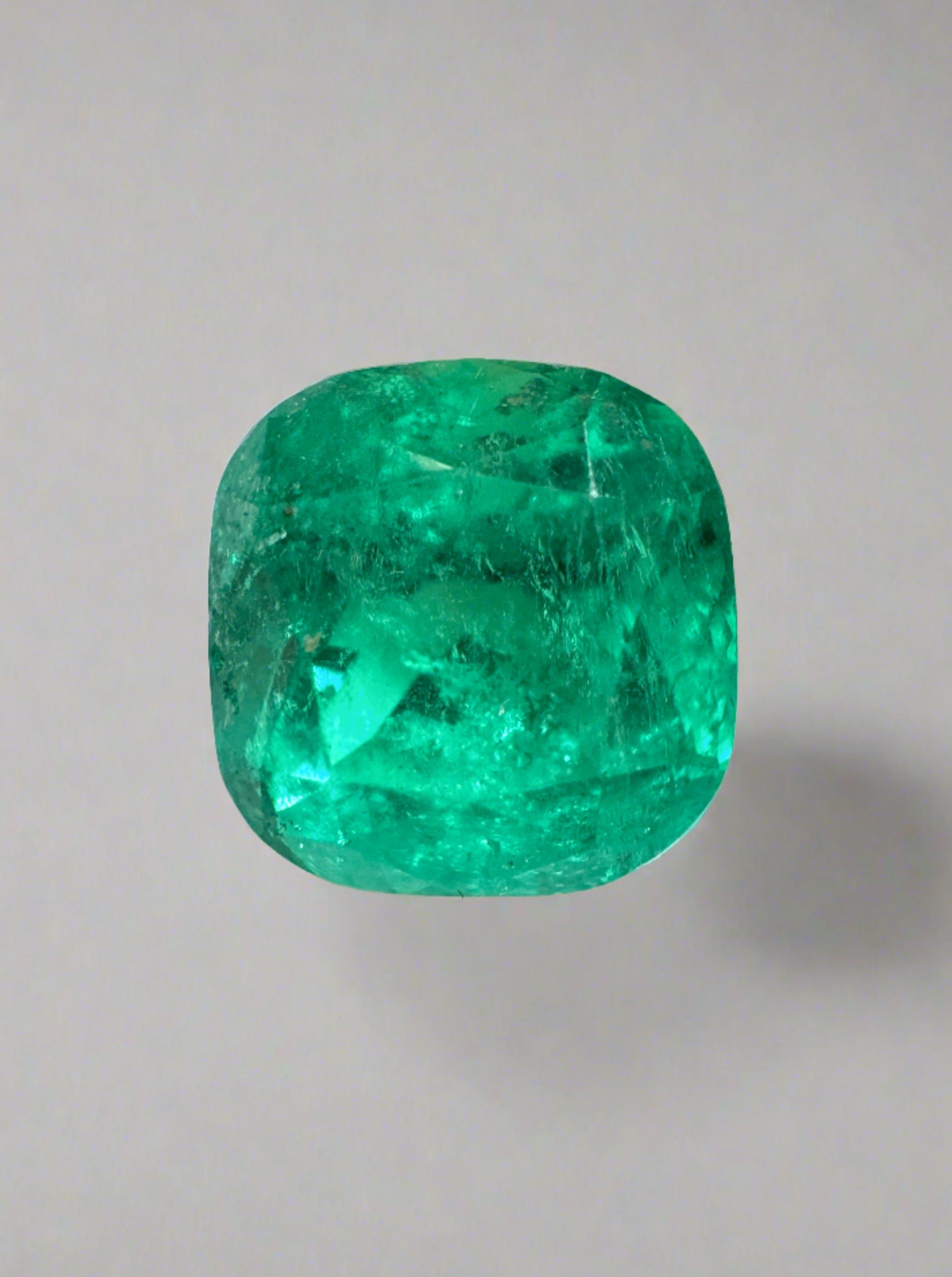 Natural 2.63 carat Colombian emerald cushion cut loose gemstone from JR Colombian Emeralds, vibrant green and finely faceted.