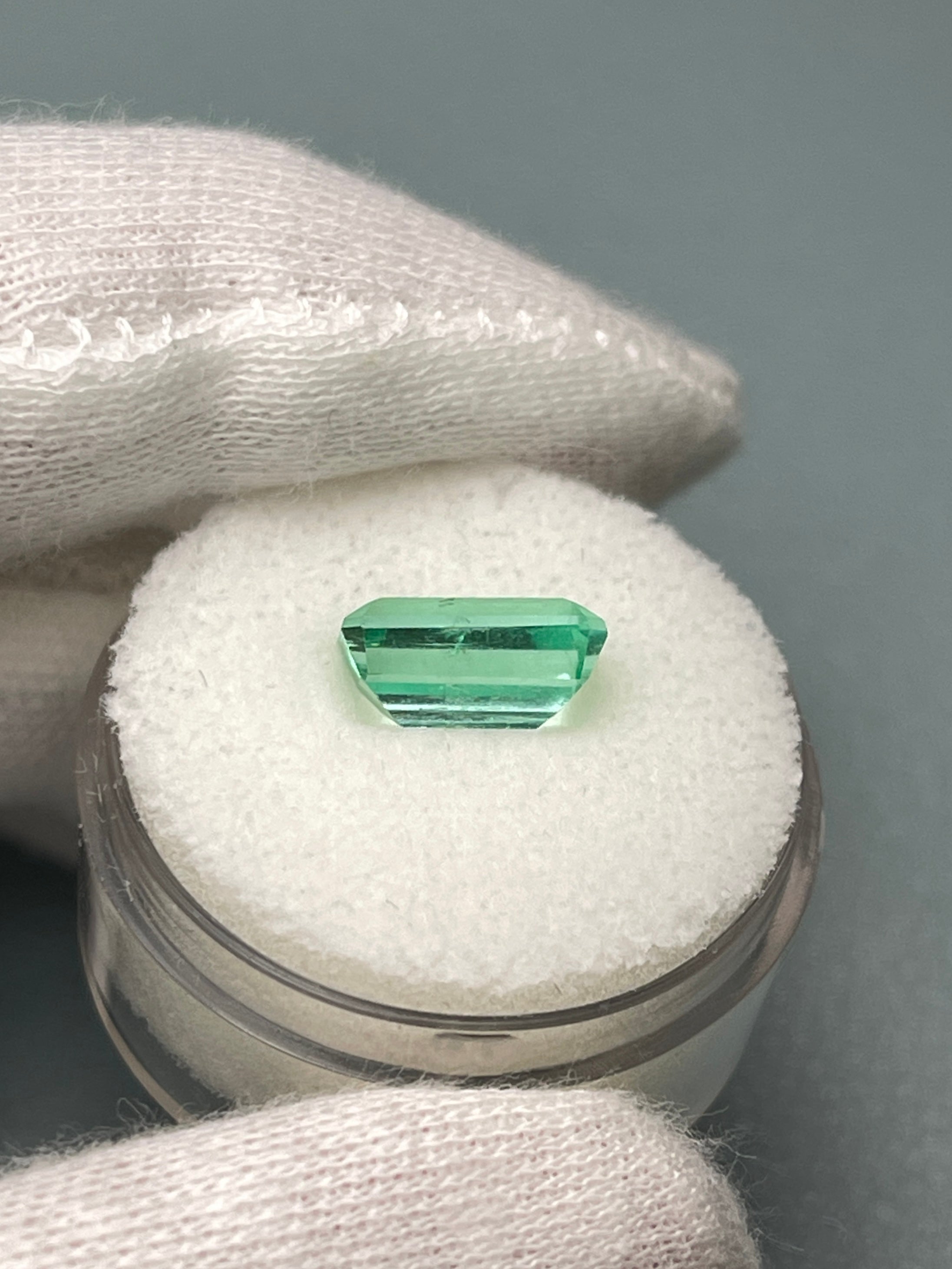 2.64 carat pastel yellowish-green Colombian emerald loose gemstone in emerald cut, from JR Colombian Emeralds.