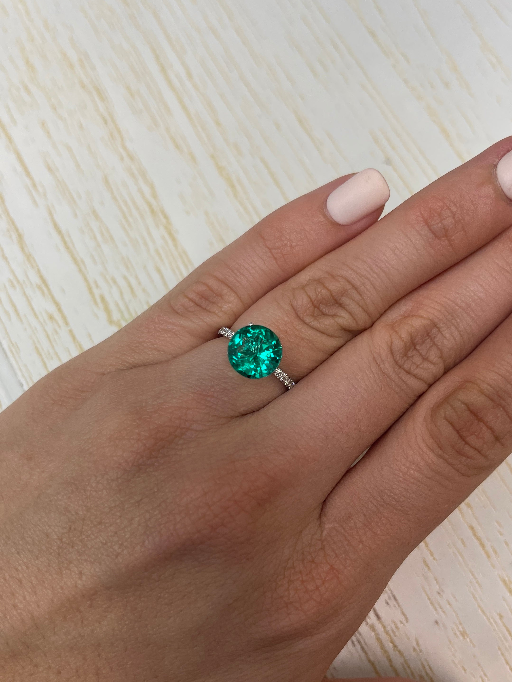 Round 2.71 carat Colombian emerald with AAA+ clarity, natural oil, and drop of oil effect, loose gemstone, 10x10mm size.