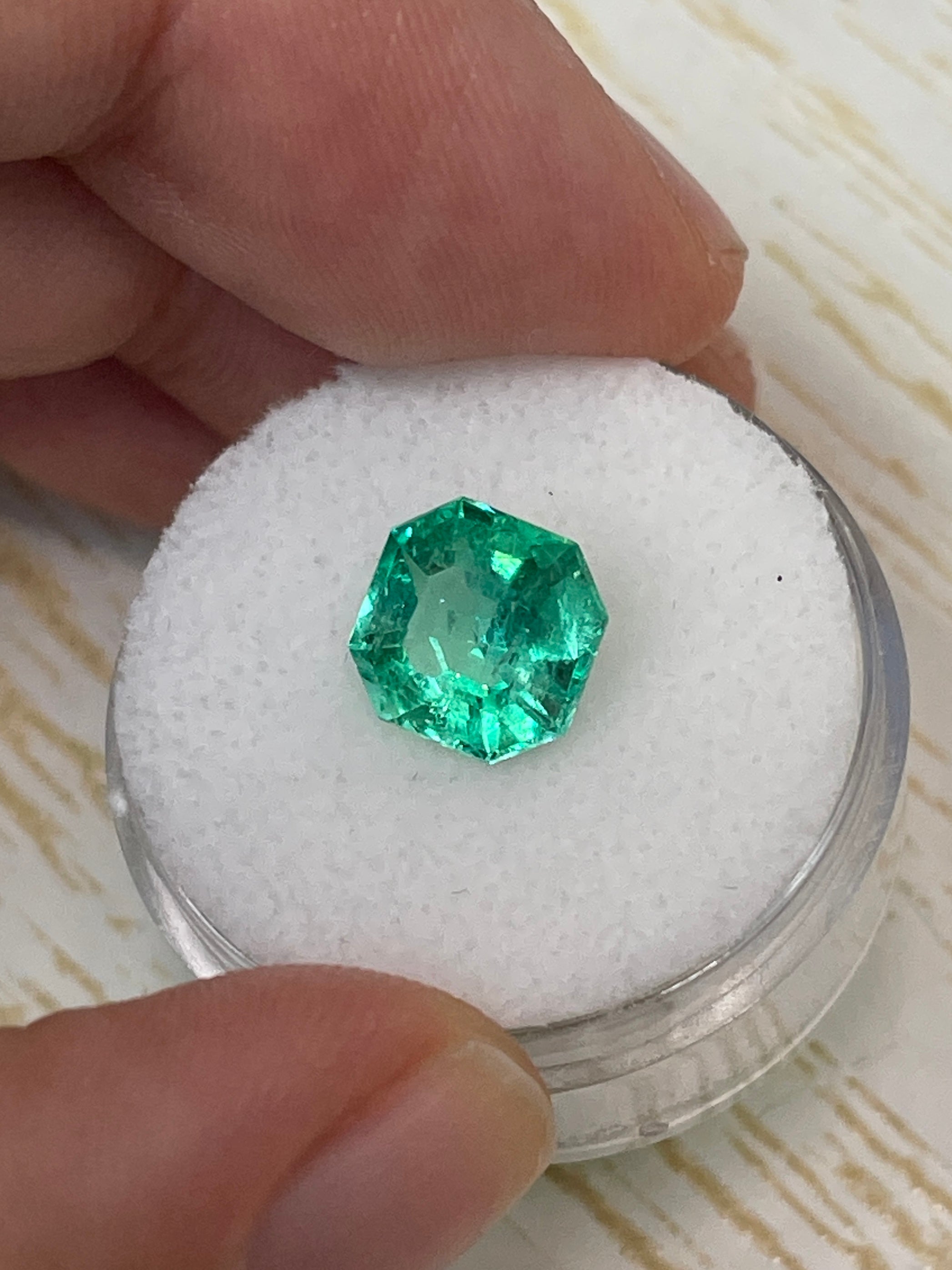 2.76 Carat natural Colombian emerald loose gemstone with Asscher cut and clipped corners, vibrant green color, from JR Colombian Emeralds.
