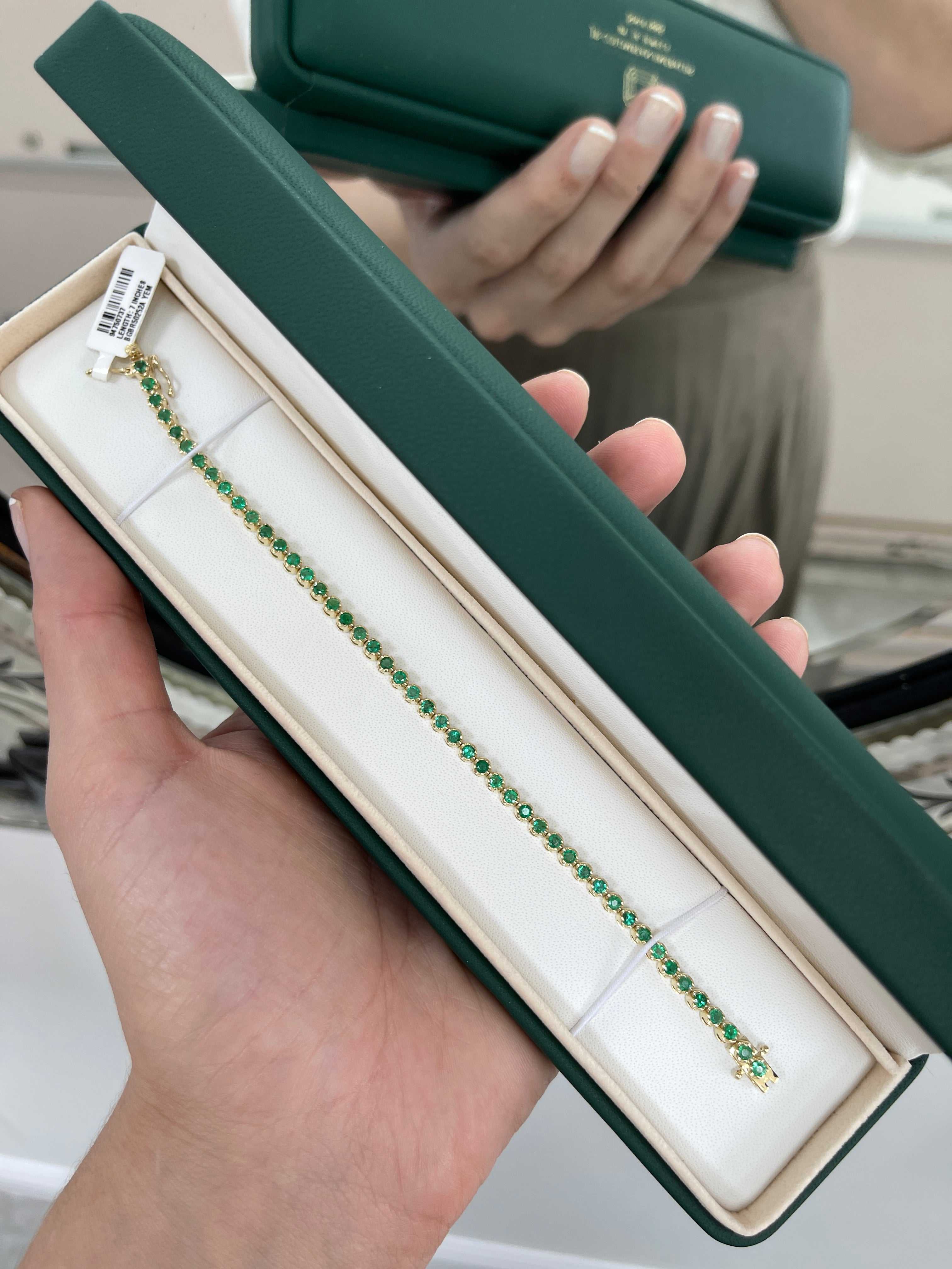 Medium green natural round emerald tennis bracelet by JR Colombian Emeralds, 14K gold, 7-inch length, 2.76 carats total weight.