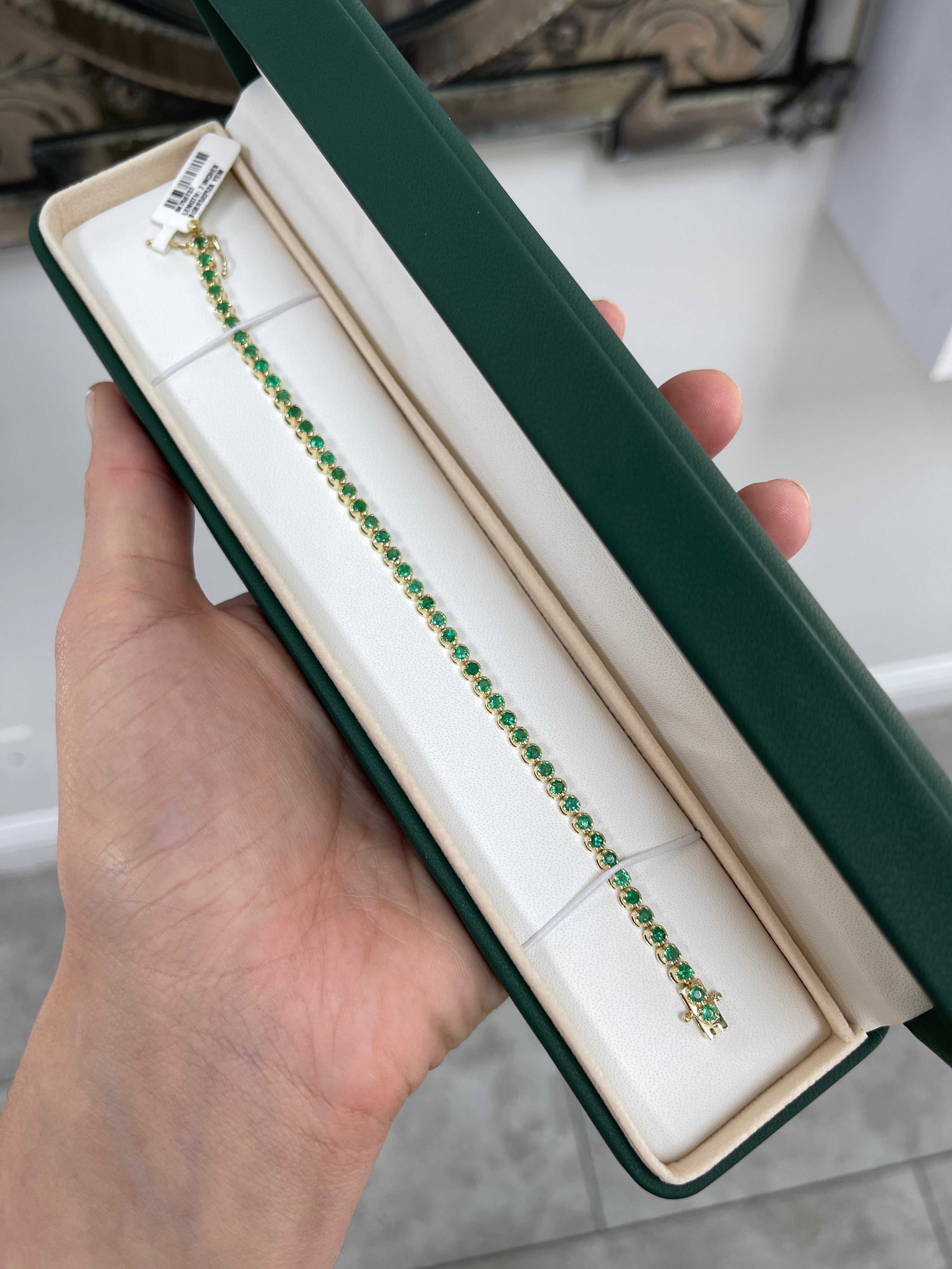 Medium green natural round emerald tennis bracelet by JR Colombian Emeralds, 7-inch 14K gold with 2.76tcw emeralds.