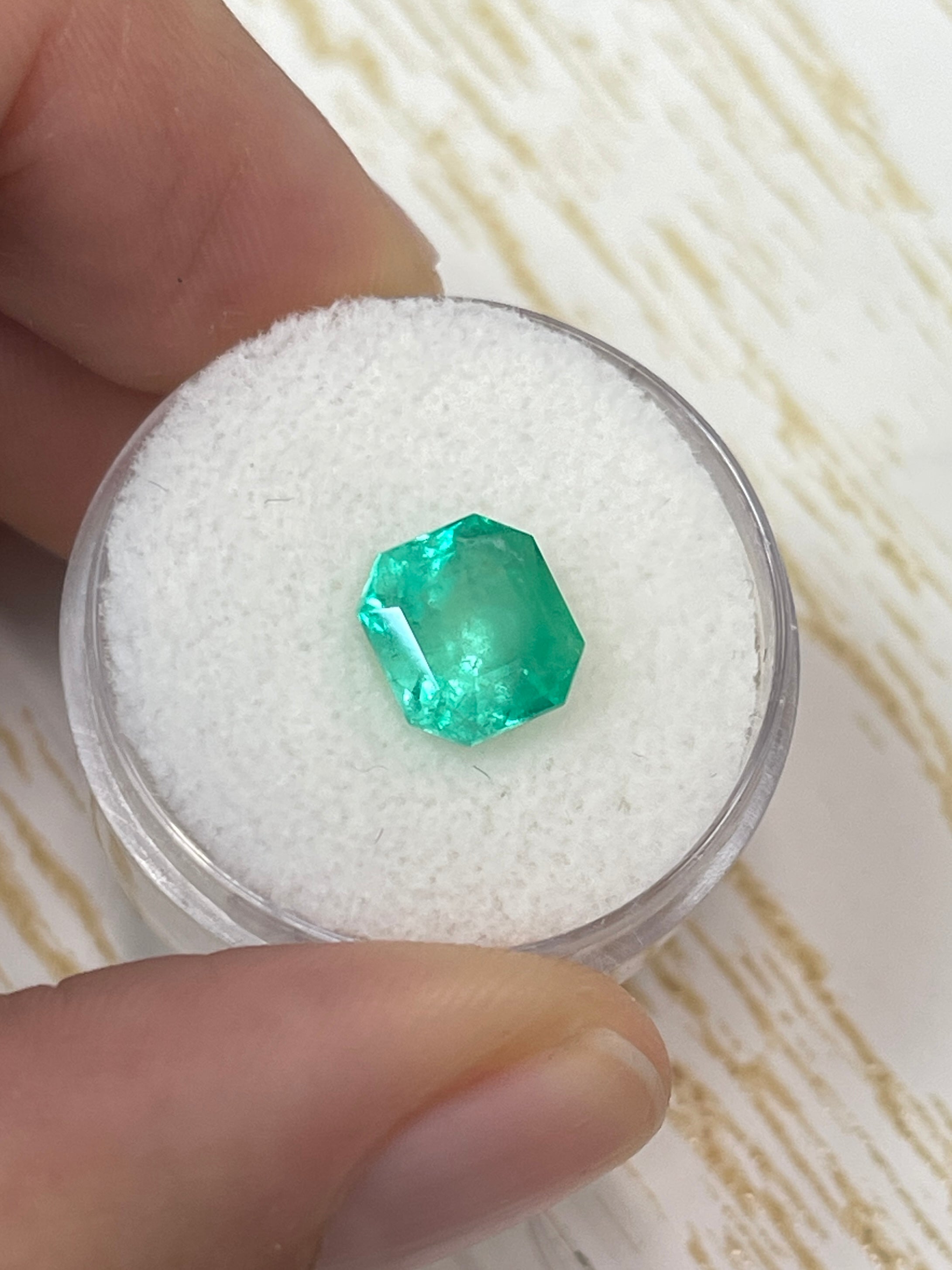 2.78 Carat yellowish green Colombian emerald loose Asscher cut gemstone from JR Colombian Emeralds, natural and faceted.