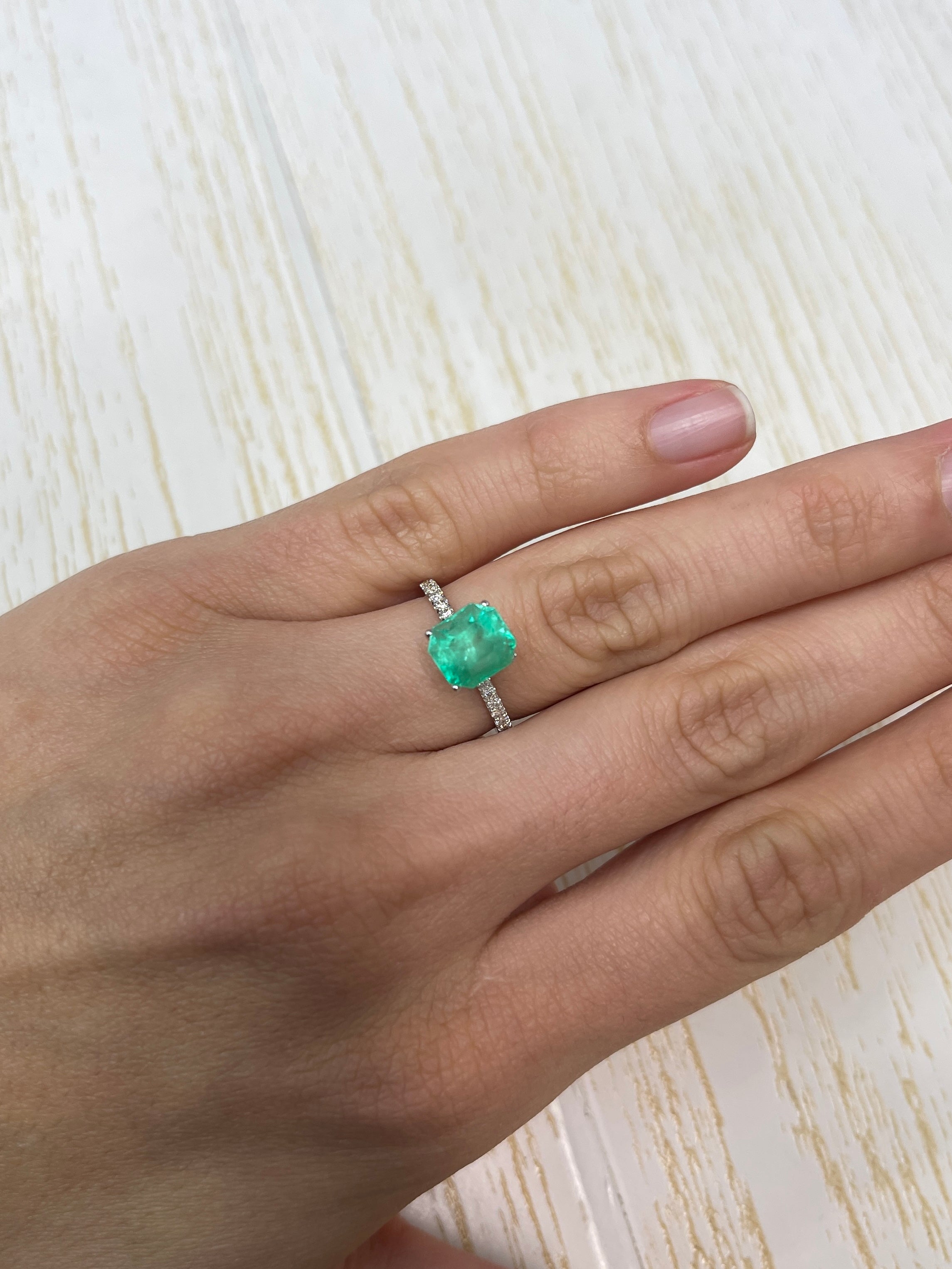2.78 carat yellowish green natural Colombian emerald loose Asscher cut gemstone from JR Colombian Emeralds.