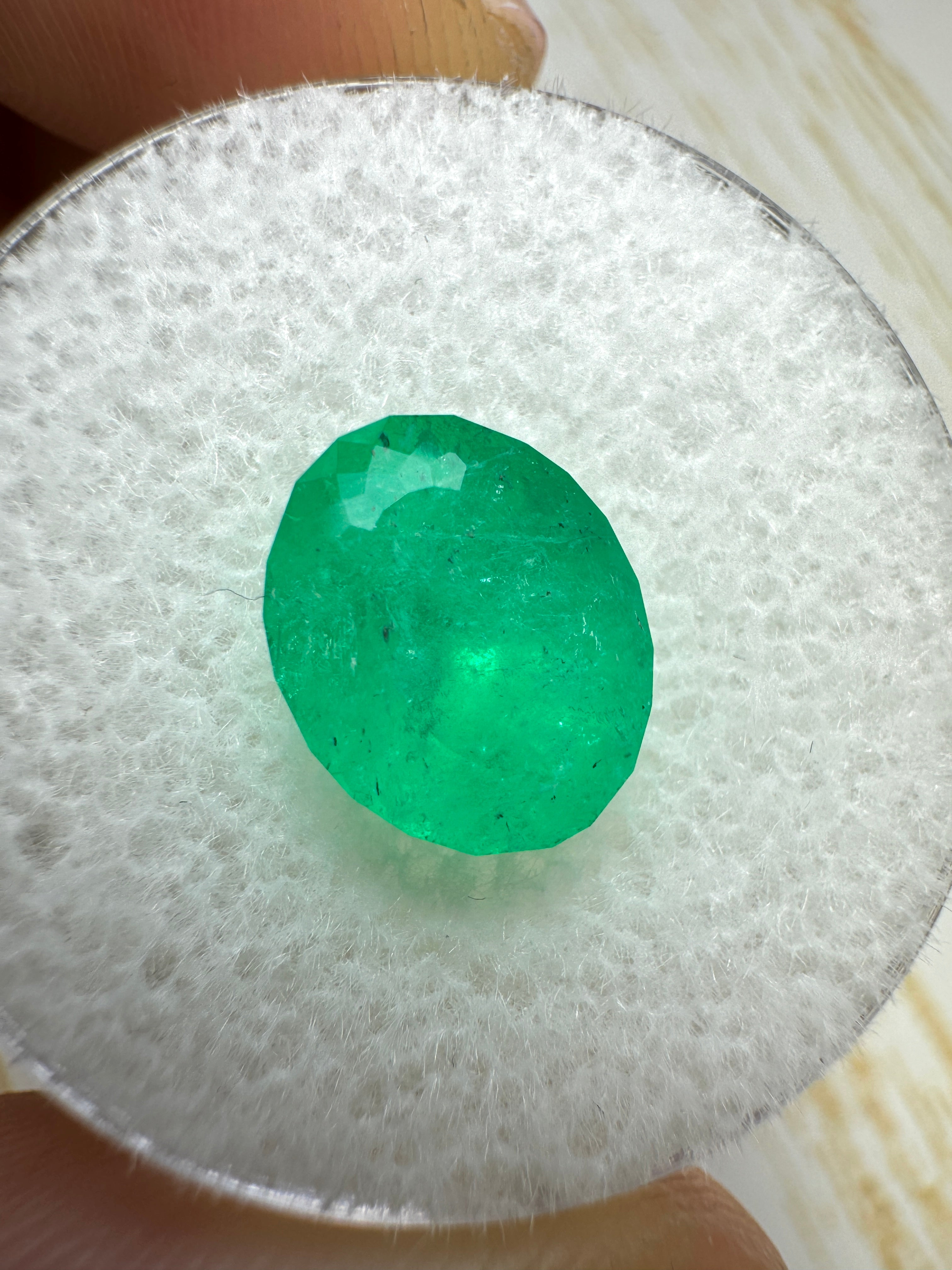 Medium green 2.79 carat natural Colombian emerald loose oval cut by JR Colombian Emeralds. Rich green gemstone with oval shape.