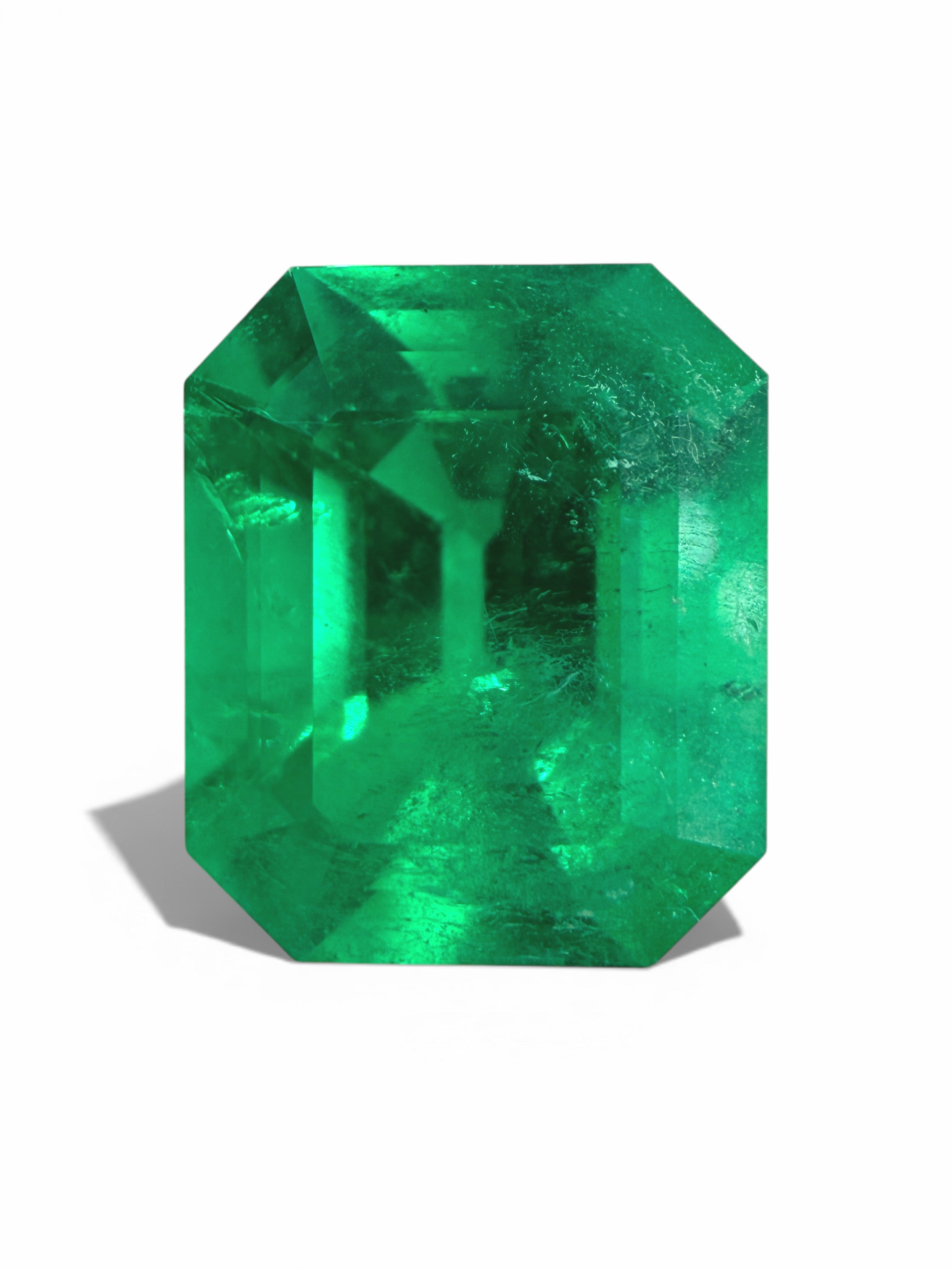 2.80 carat Kryptonite vivid green natural Colombian emerald loose gemstone with emerald cut, displayed by JR Colombian Emeralds.