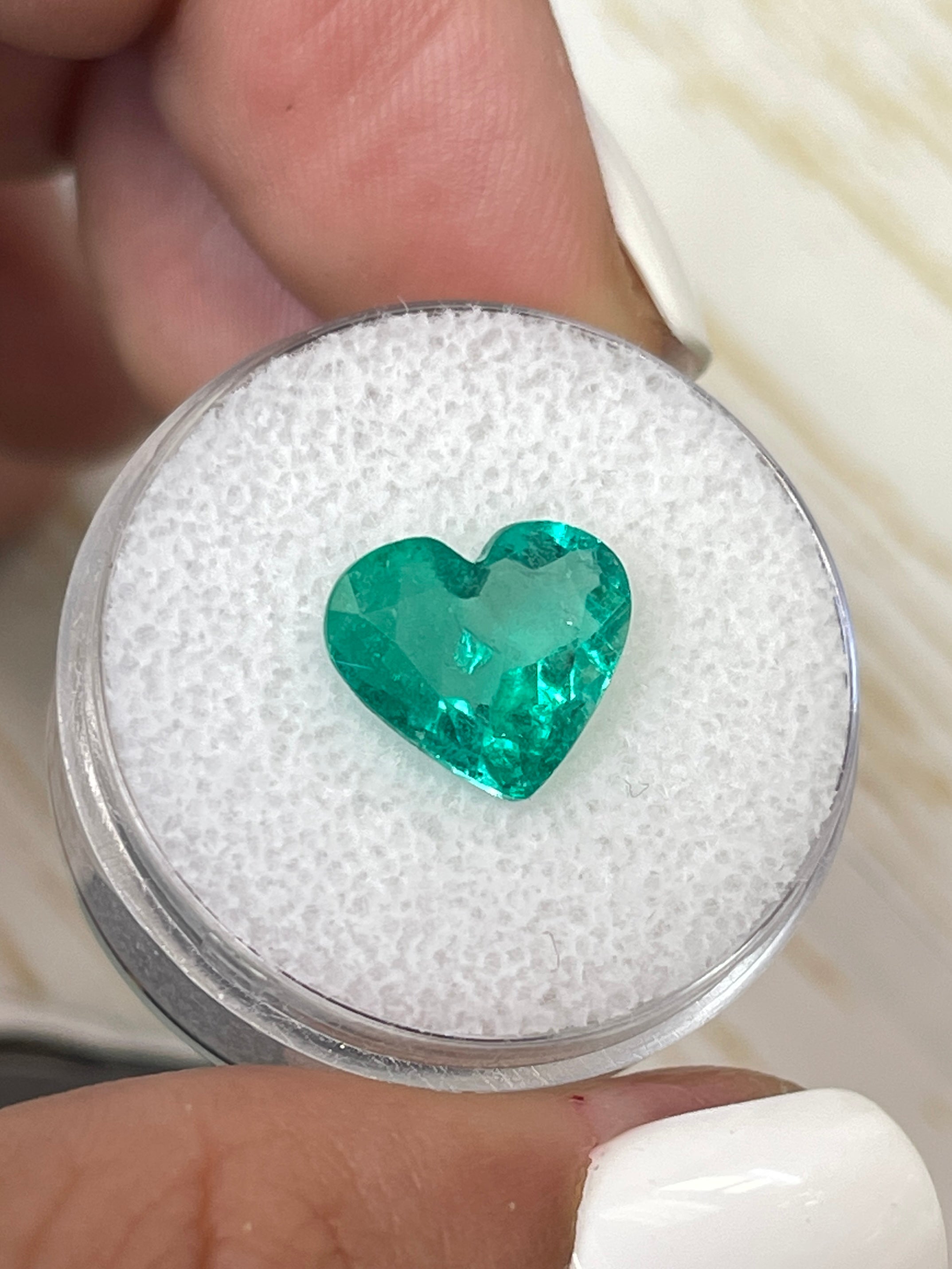 Bright green 2.84 carat natural Colombian emerald in heart cut, loose gemstone, from JR Colombian Emeralds.