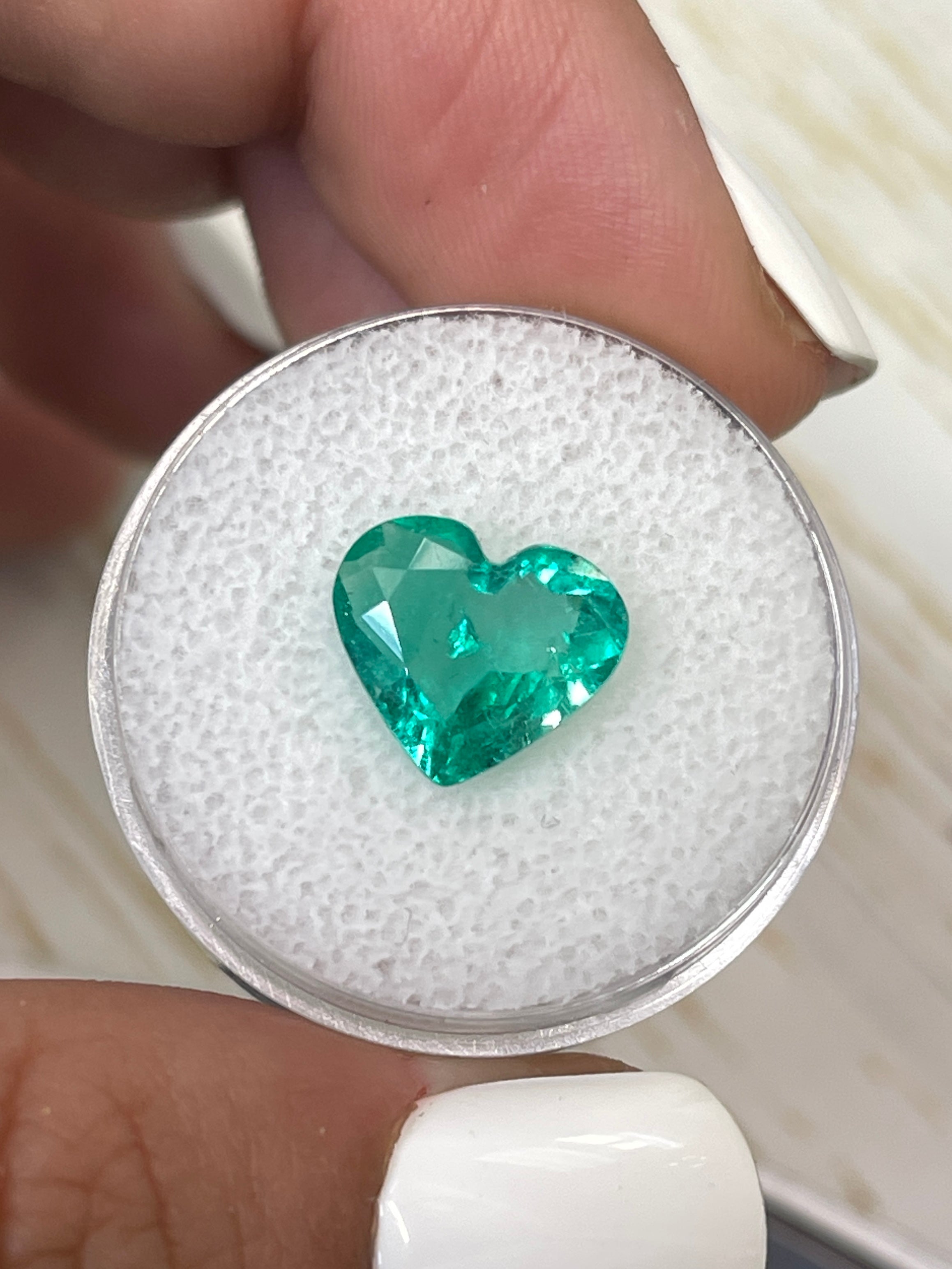 Bright green 2.84 carat natural Colombian emerald in heart cut, loose gemstone from JR Colombian Emeralds.
