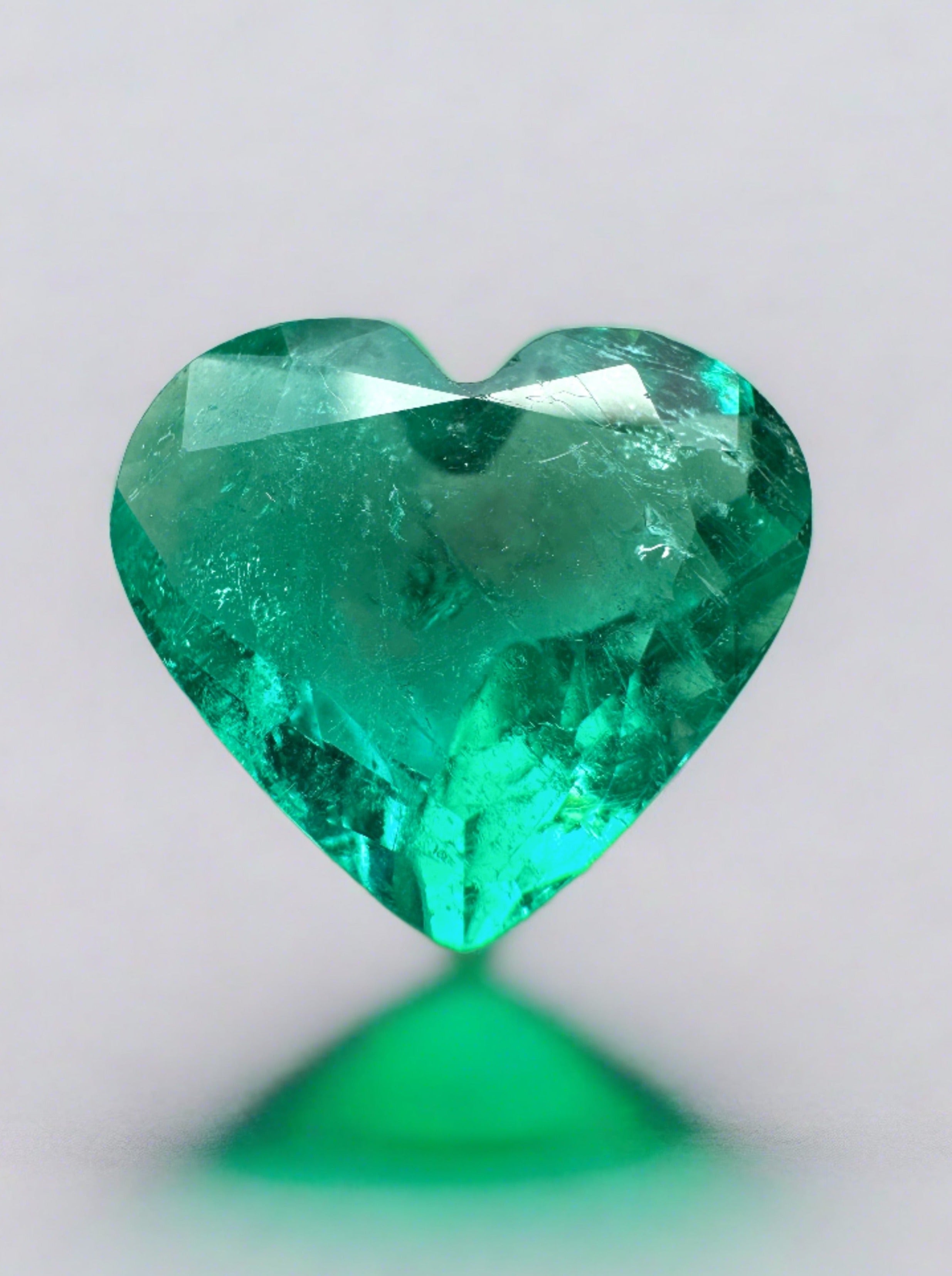 Bright green 2.84 carat natural Colombian emerald in heart cut, loose gemstone from JR Colombian Emeralds.