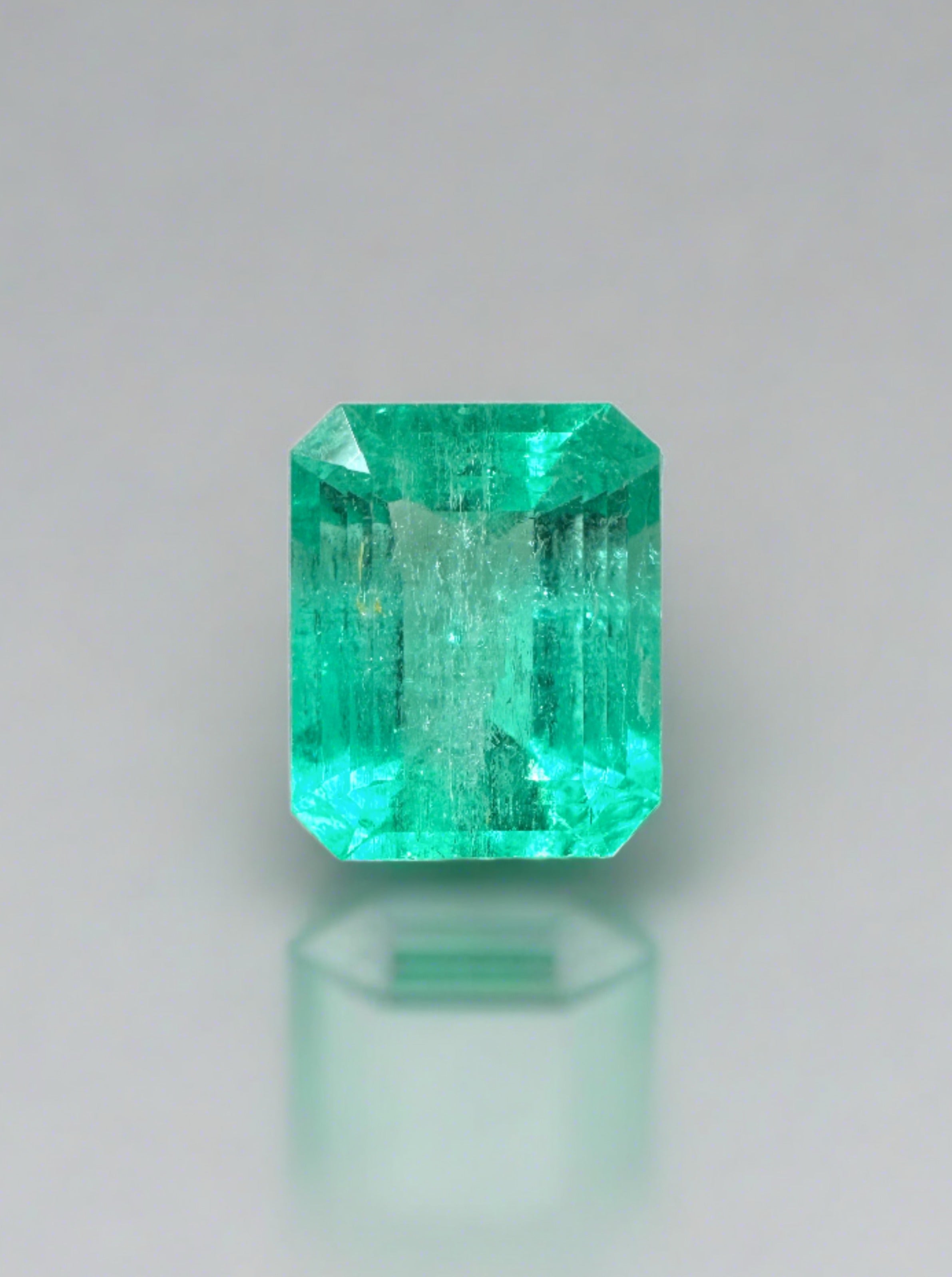2.84 carat natural Colombian emerald loose gemstone in emerald cut, showcasing vibrant green color and chunky size.