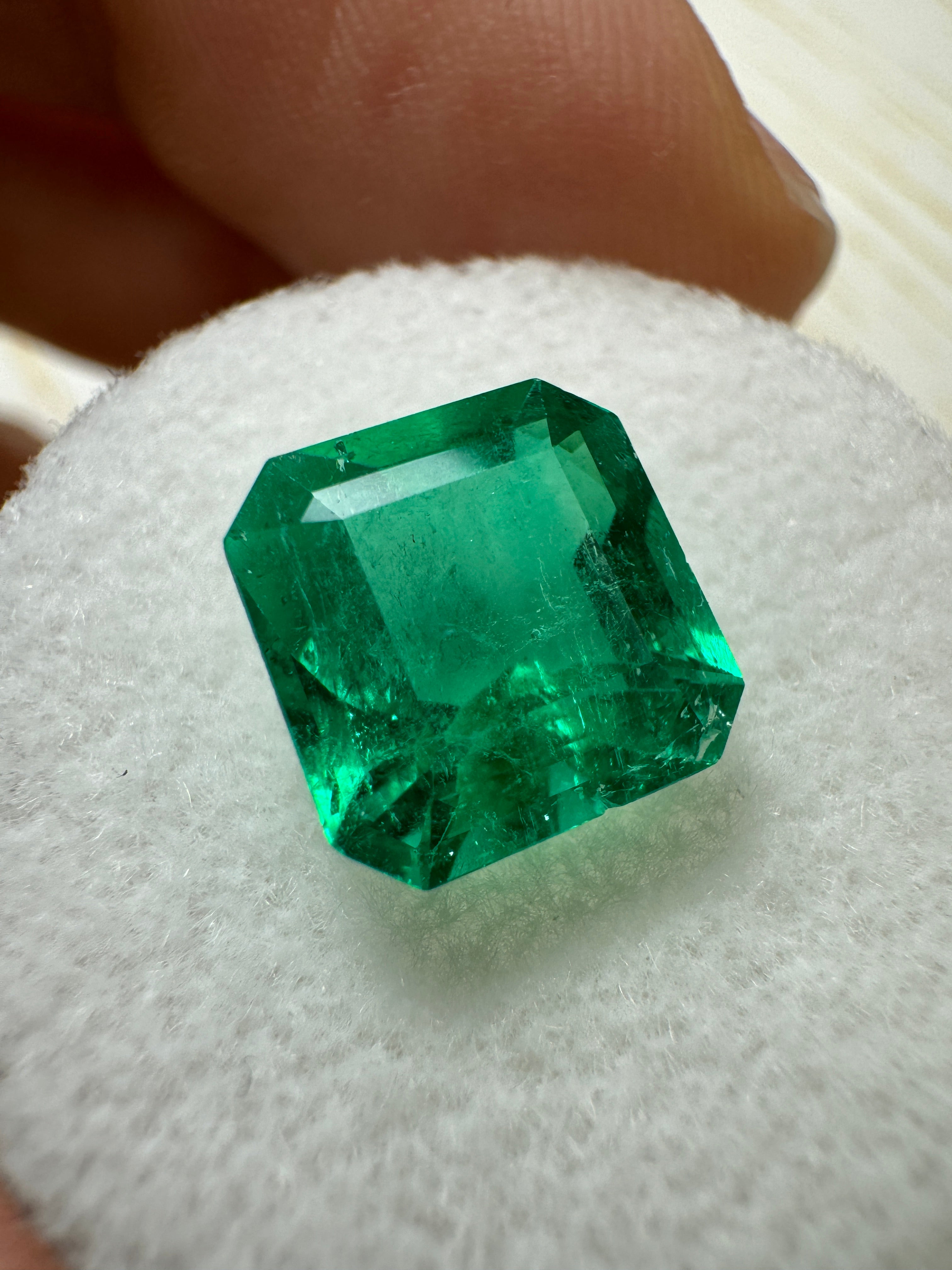 Vivid 2.84 carat Muzo Colombian emerald loose gemstone in 9x9mm Asscher cut, showcasing deep green color and natural clarity.