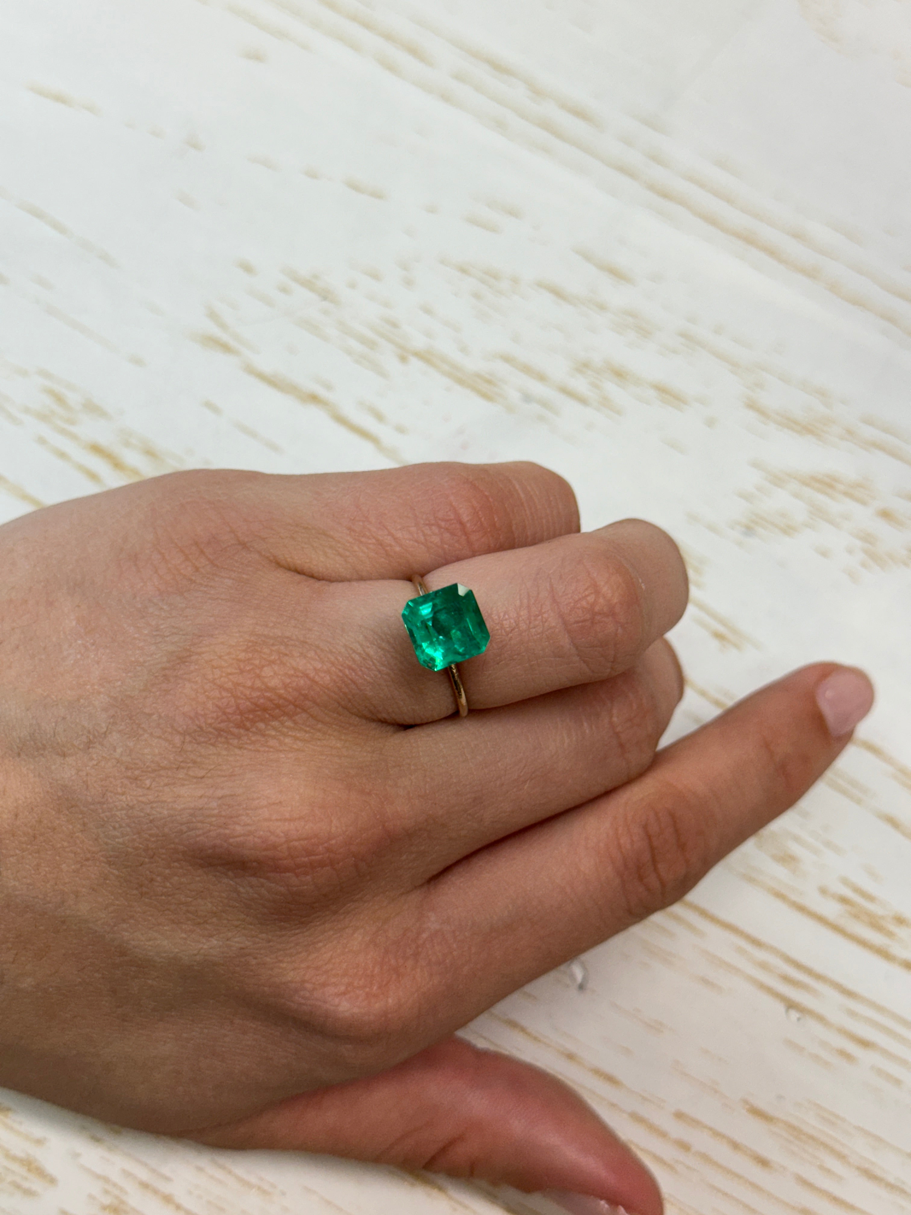 Vivid 2.84 Carat Muzo Colombian Emerald in 9x9mm Asscher cut, natural loose gemstone from JR Colombian Emeralds.
