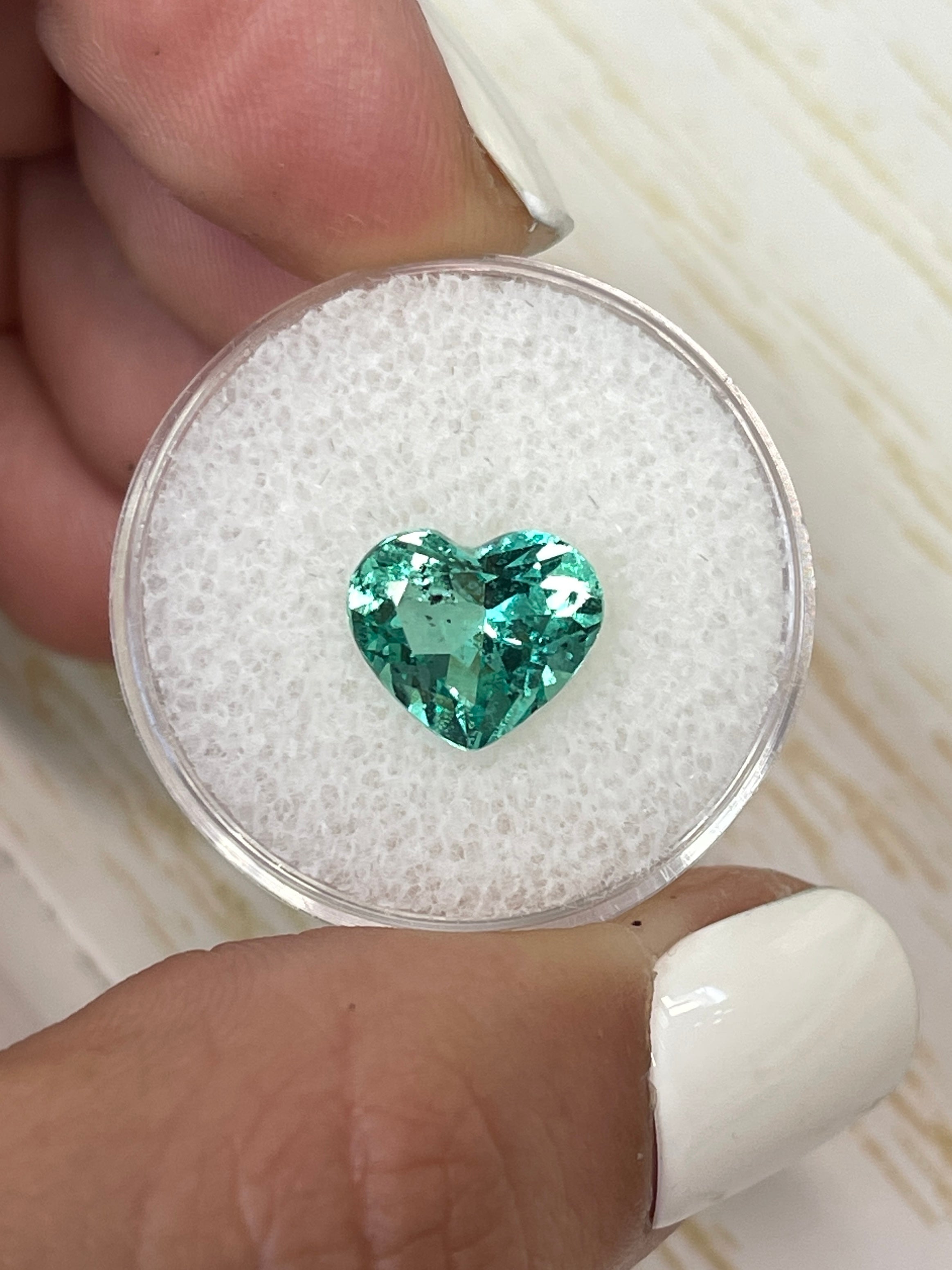Lustrous 2.87 Carat green Colombian emerald loose heart cut gemstone by JR Colombian Emeralds. Natural, vibrant, and finely faceted.