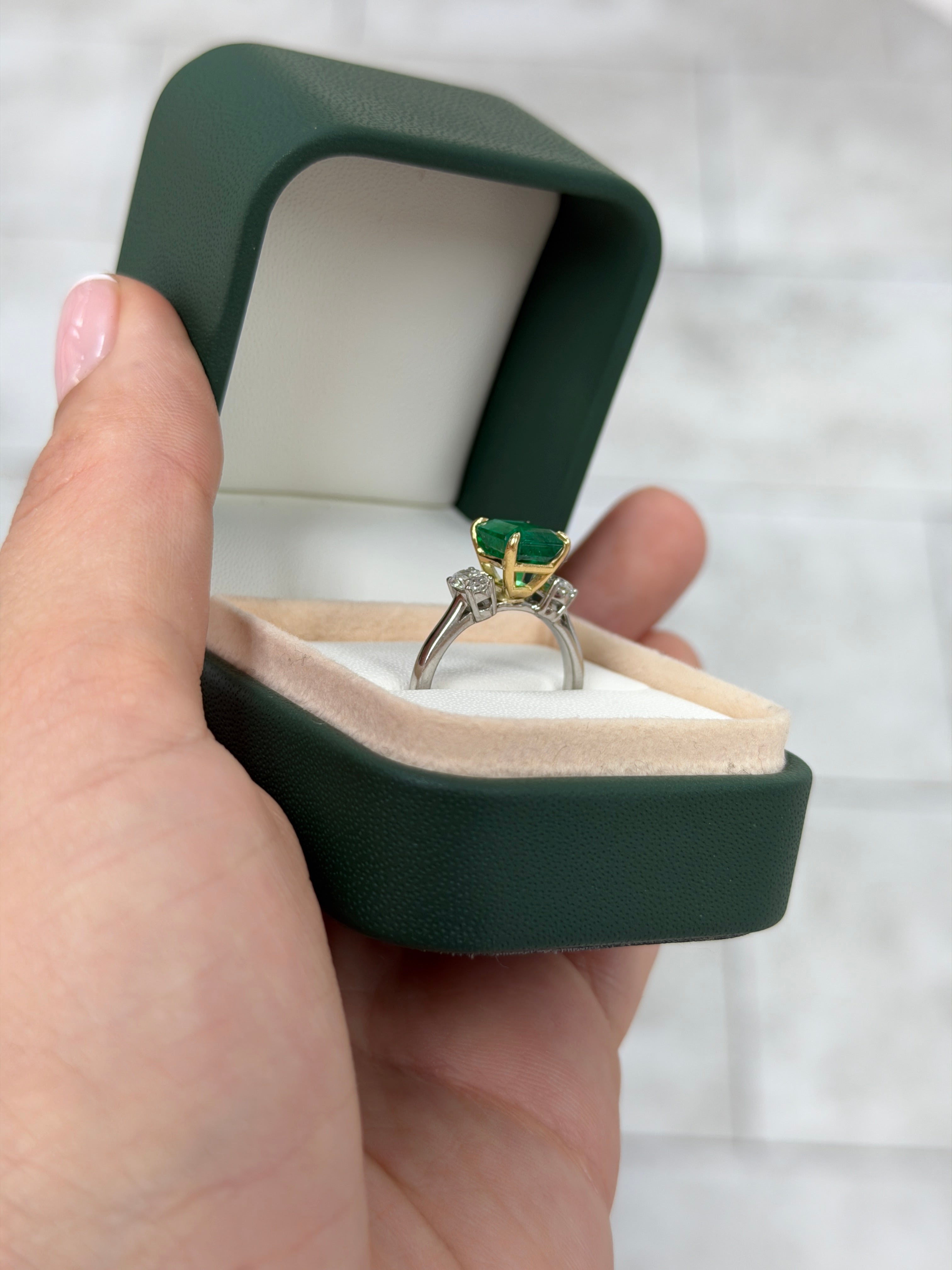 18K Vivid Asscher cut emerald and oval diamond three-stone ring by JR Colombian Emeralds, featuring platinum setting and 2.88 tcw.