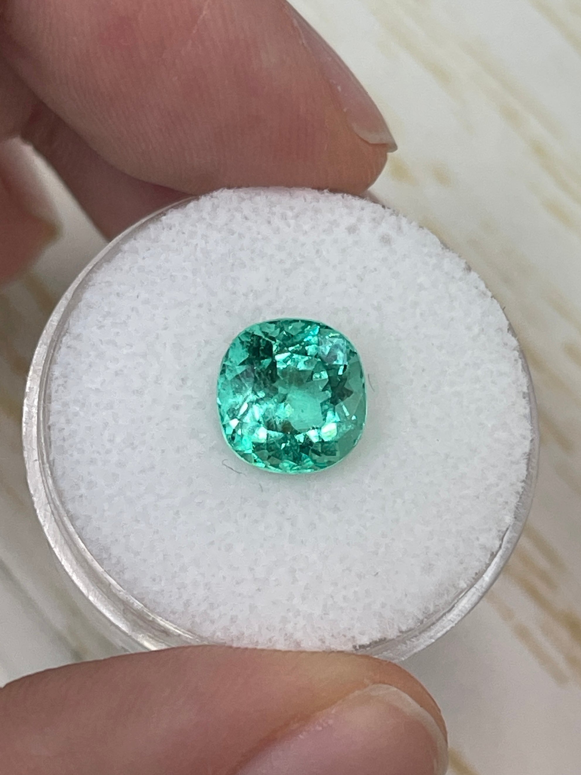Natural 2.93 carat Colombian emerald loose cushion cut with VVS clarity from JR Colombian Emeralds, showcasing vibrant green color.