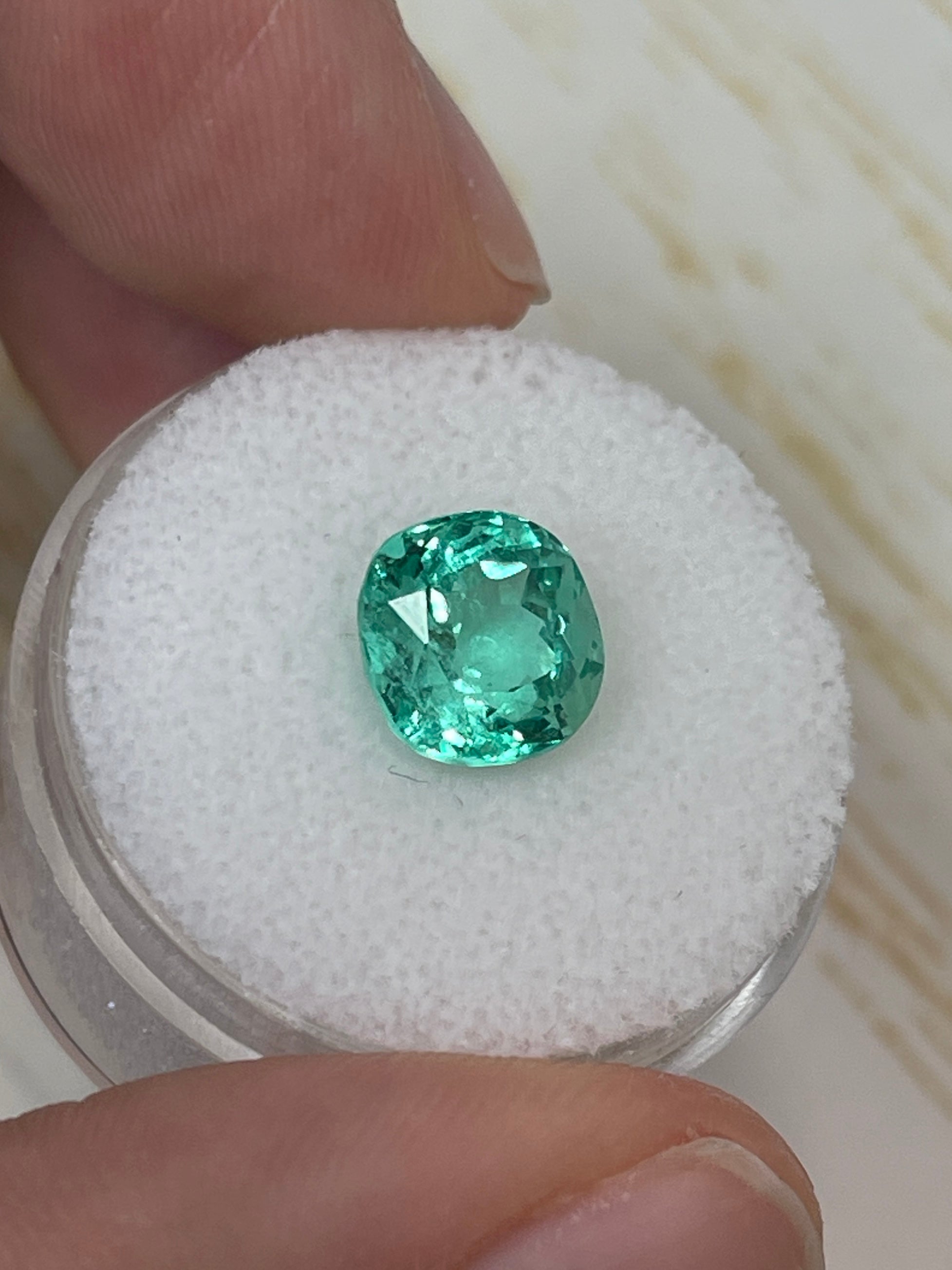 VVS natural Colombian emerald loose gemstone, 2.93 carats, cushion cut, measuring 8.7x8.5 mm, from JR Colombian Emeralds.