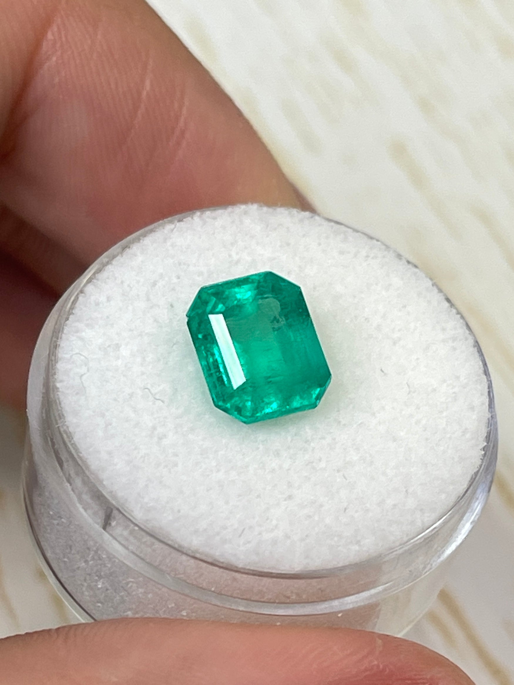 2.93 carat natural Colombian emerald in an emerald cut, showcasing vibrant green color and clarity, from JR Colombian Emeralds.