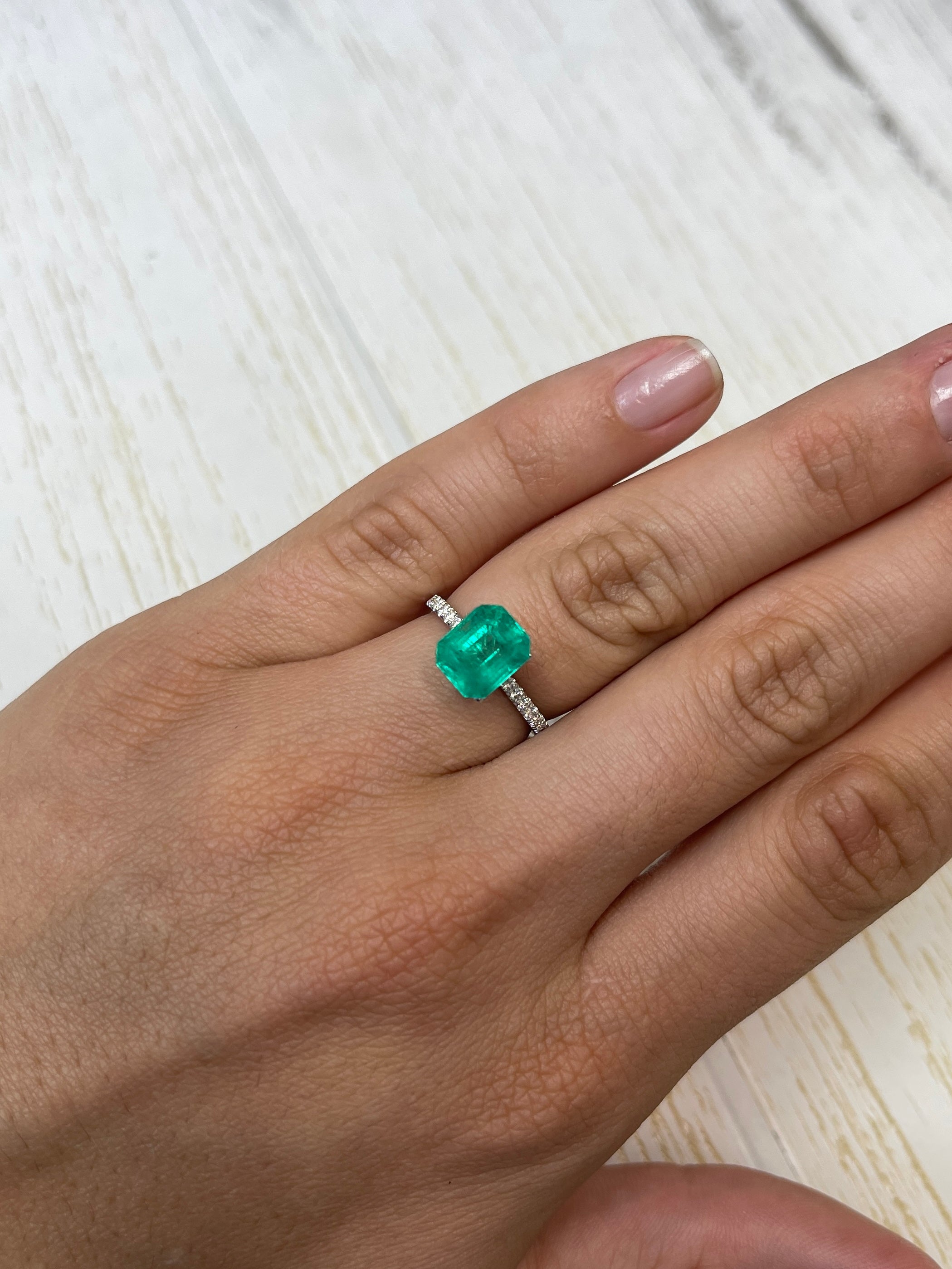 2.93 carat natural Colombian emerald loose gemstone in an emerald cut, featuring vibrant green color and clarity, from JR Colombian Emeralds.