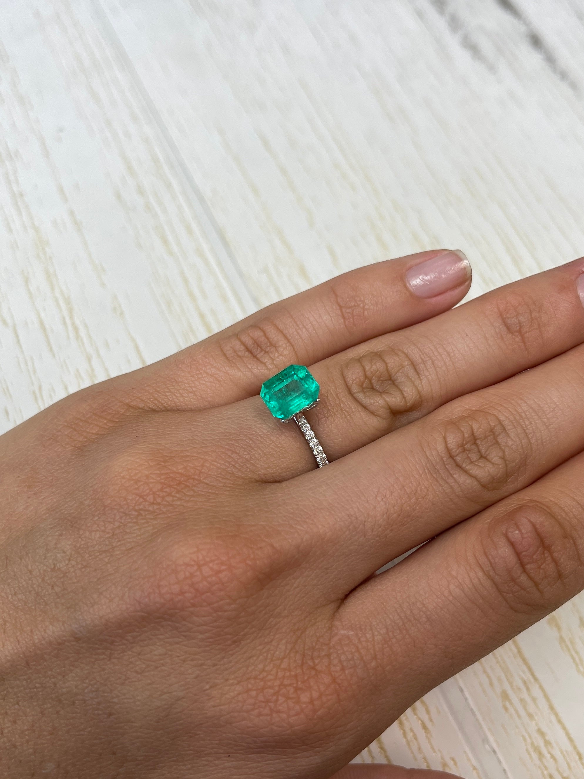 2.93 carat natural Colombian emerald loose gemstone, emerald cut, showcasing vibrant green color and clarity, from JR Colombian Emeralds.