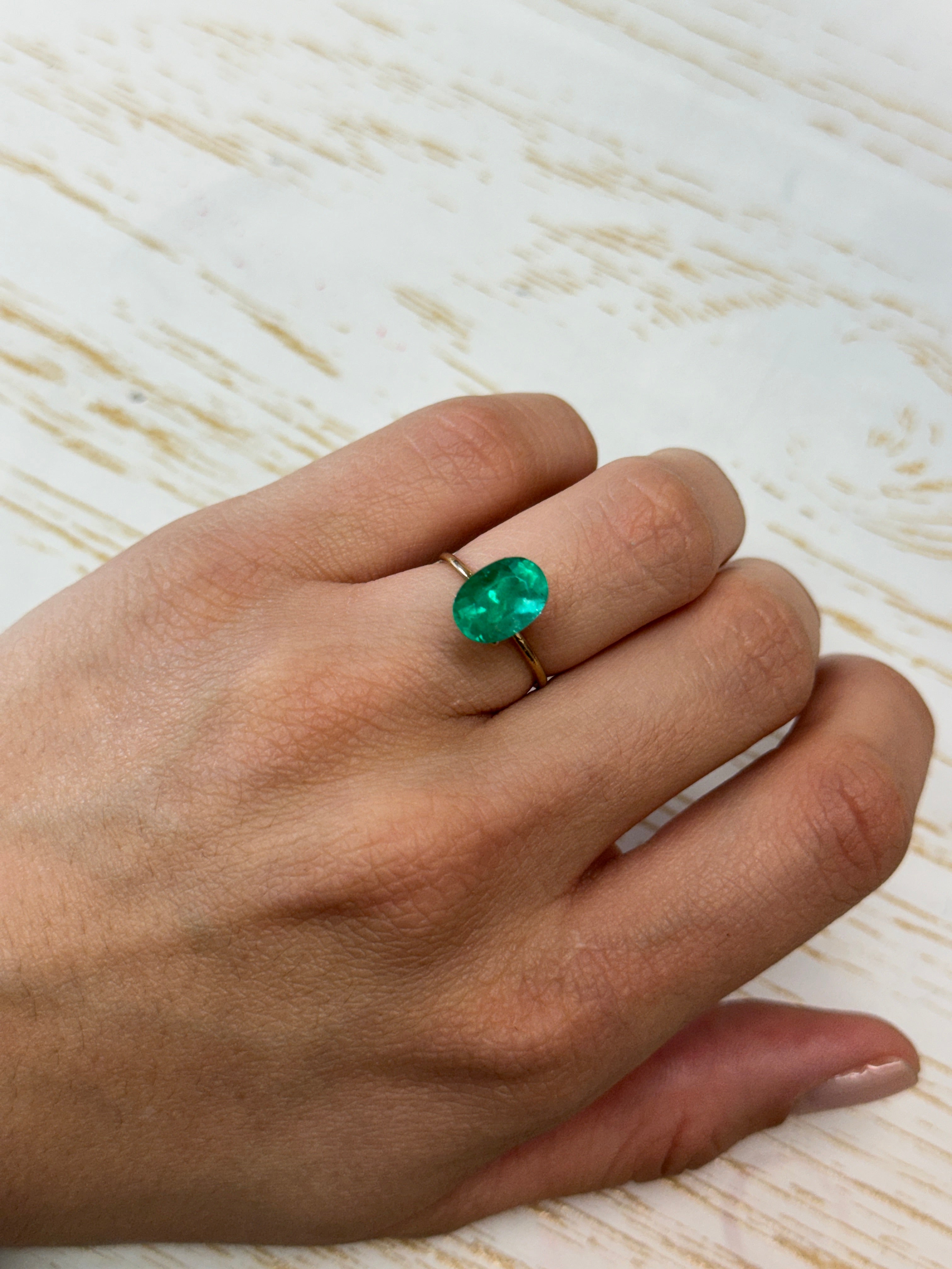 2.95 carat Colombian emerald loose oval cut with elongated 11x8mm shape, semi-transparent green gemstone from JR Colombian Emeralds