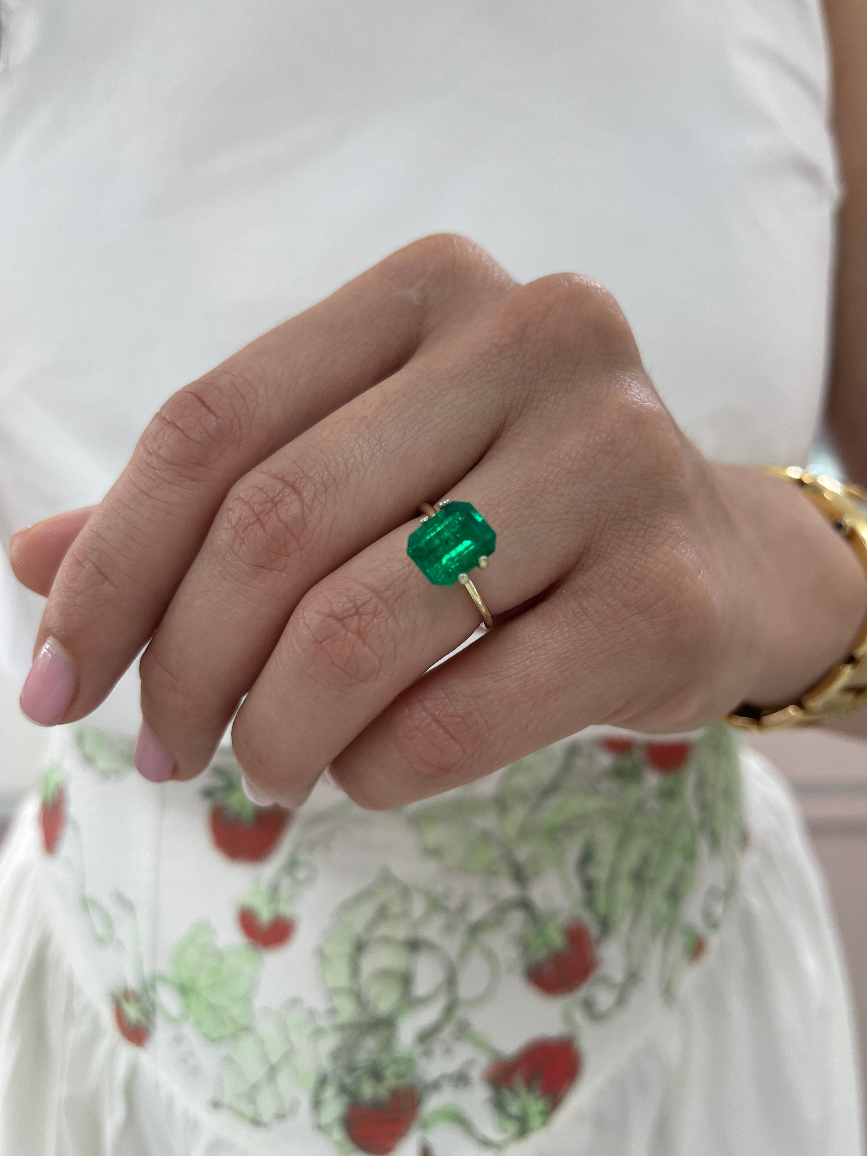 Vivid 3.08 carat Muzo green Colombian emerald loose gemstone in 10x8 emerald cut, from JR Colombian Emeralds.
