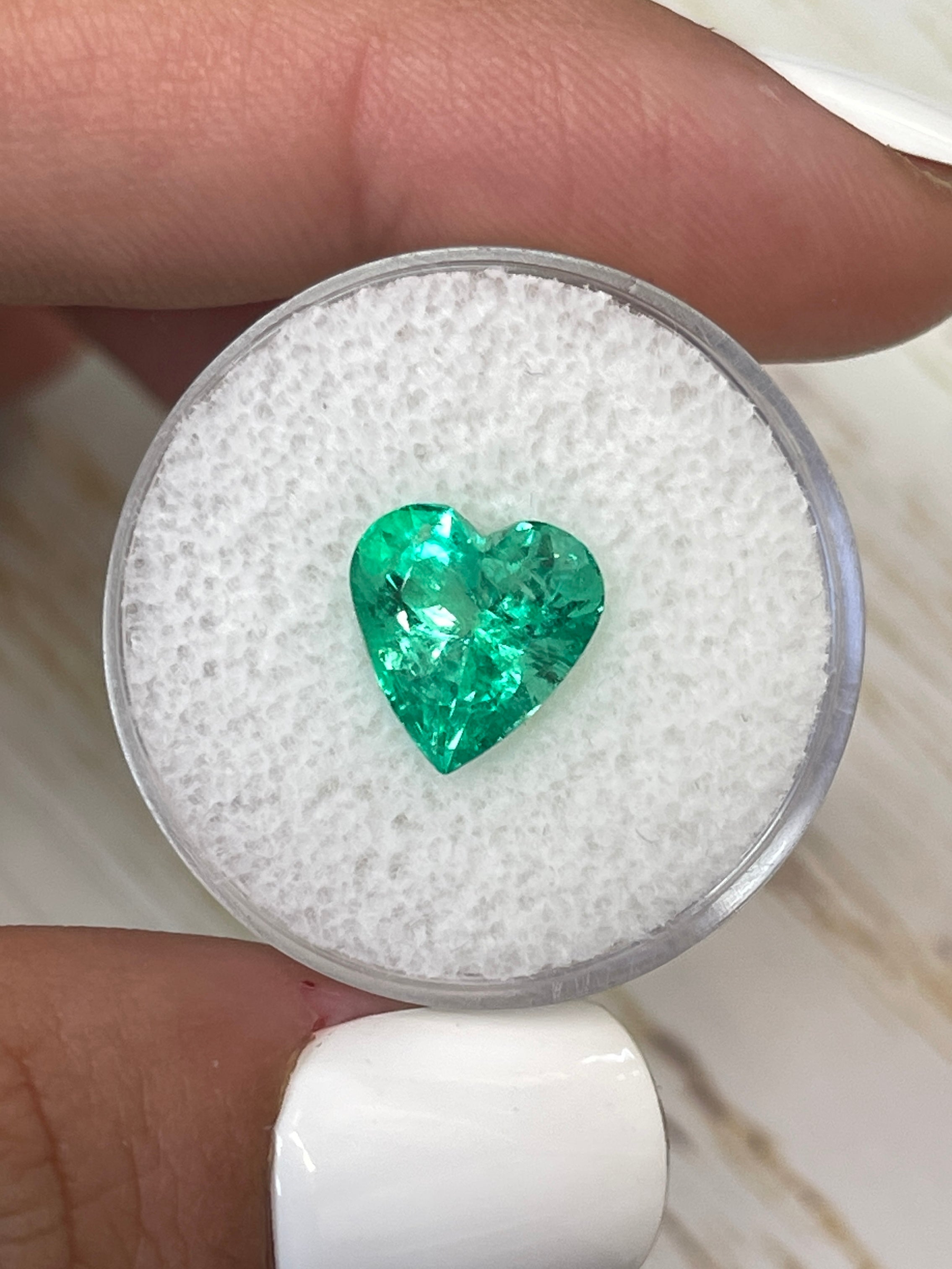 Yellowish green 3.10 carat natural Colombian emerald in heart cut, loose gemstone, from JR Colombian Emeralds.