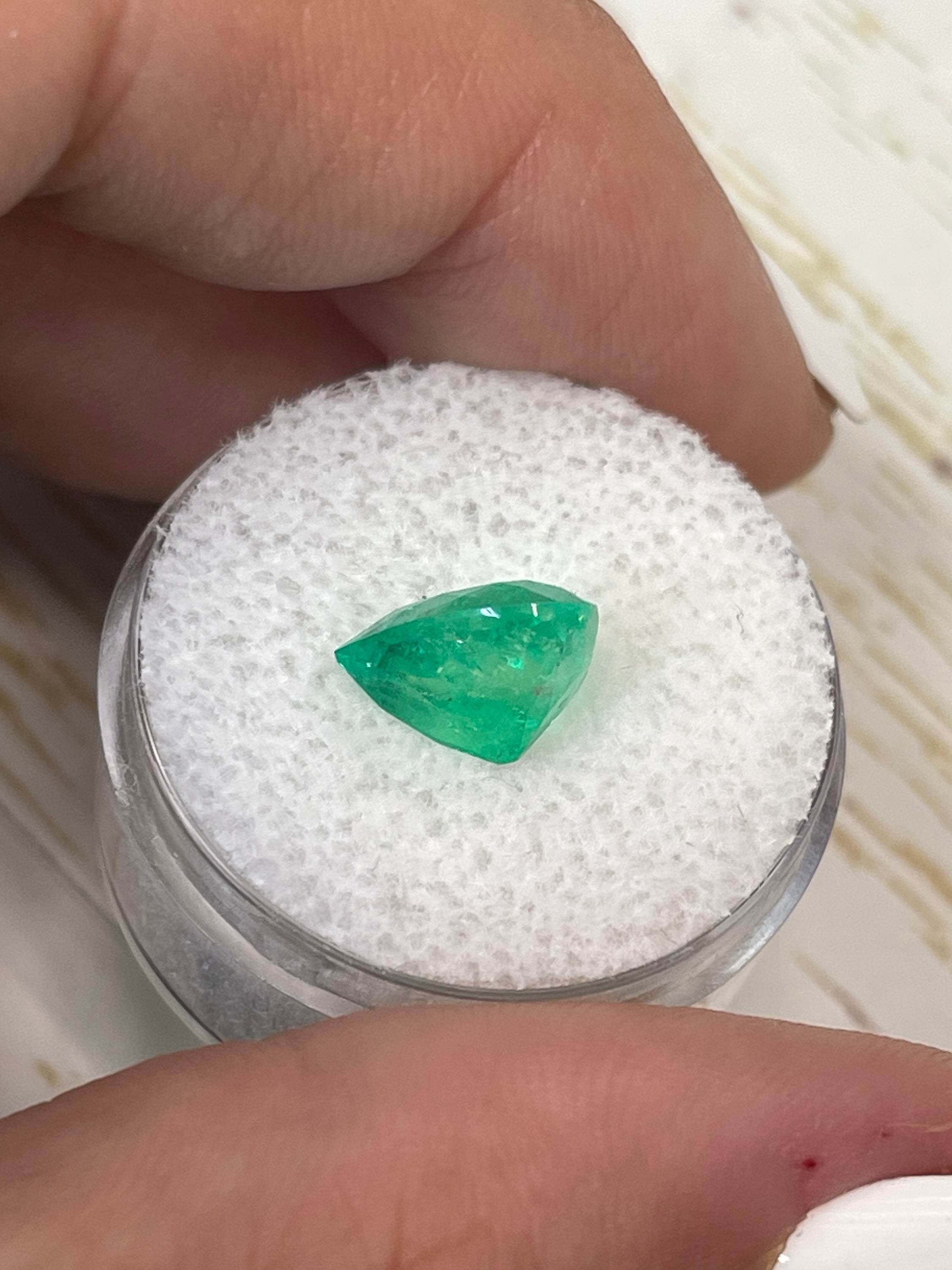 Yellowish green 3.10 carat Colombian emerald loose gemstone in heart cut, natural and vibrant from JR Colombian Emeralds.