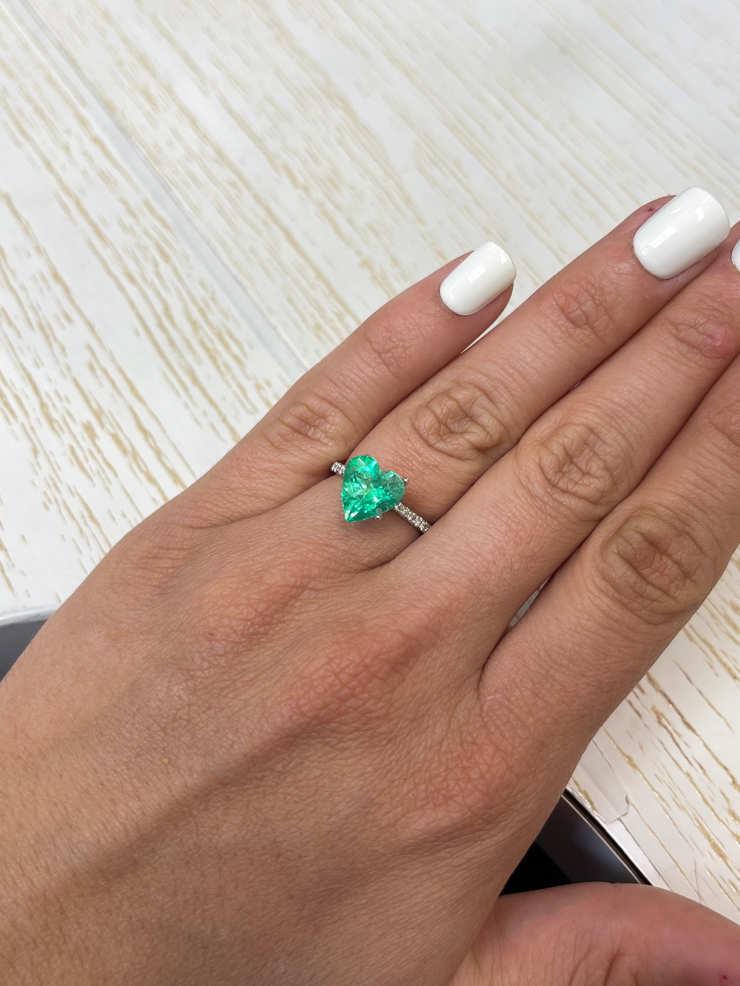 Yellowish green natural Colombian emerald in heart cut, 3.10 carats, loose gemstone from JR Colombian Emeralds.