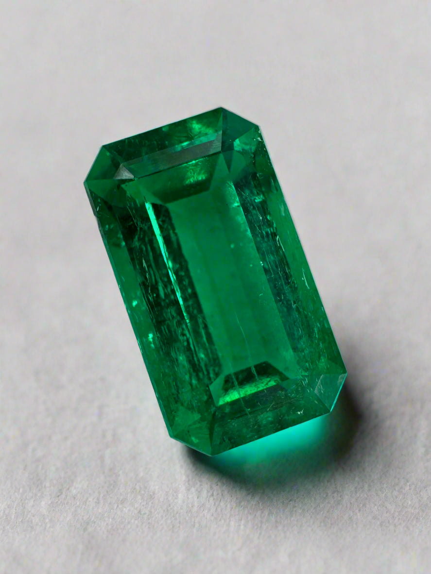 3.10 carat AAA+ Colombian emerald loose gemstone with elongated emerald cut, natural minor oil finish, from JR Colombian Emeralds.